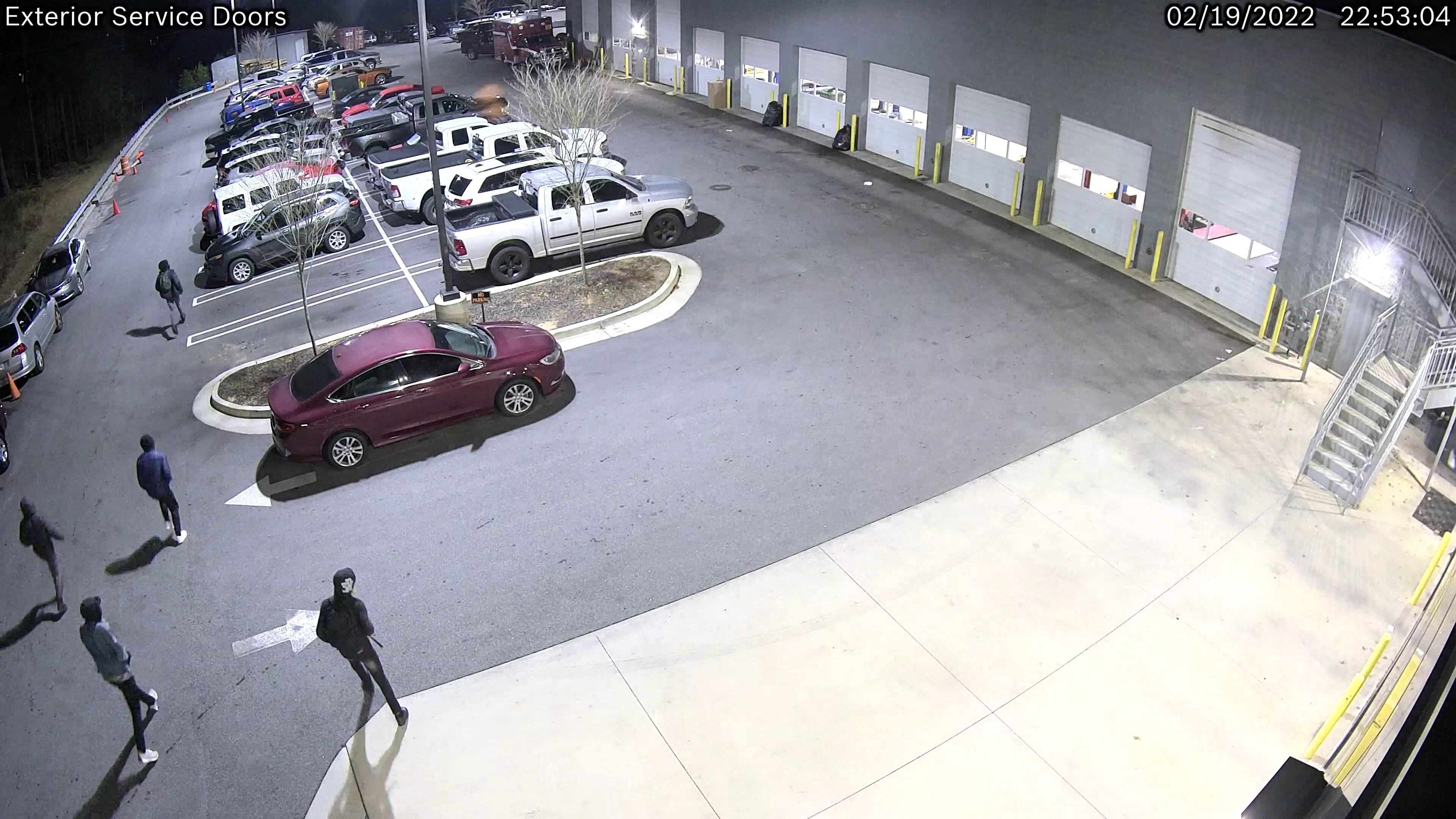 DeKalb County police are looking for five suspects in connection with the fatal shooting of a security guard at the Courtesy Chrysler Dodge dealership at 8455 Mall Parkway. (Credit: DeKalb County Police Department)