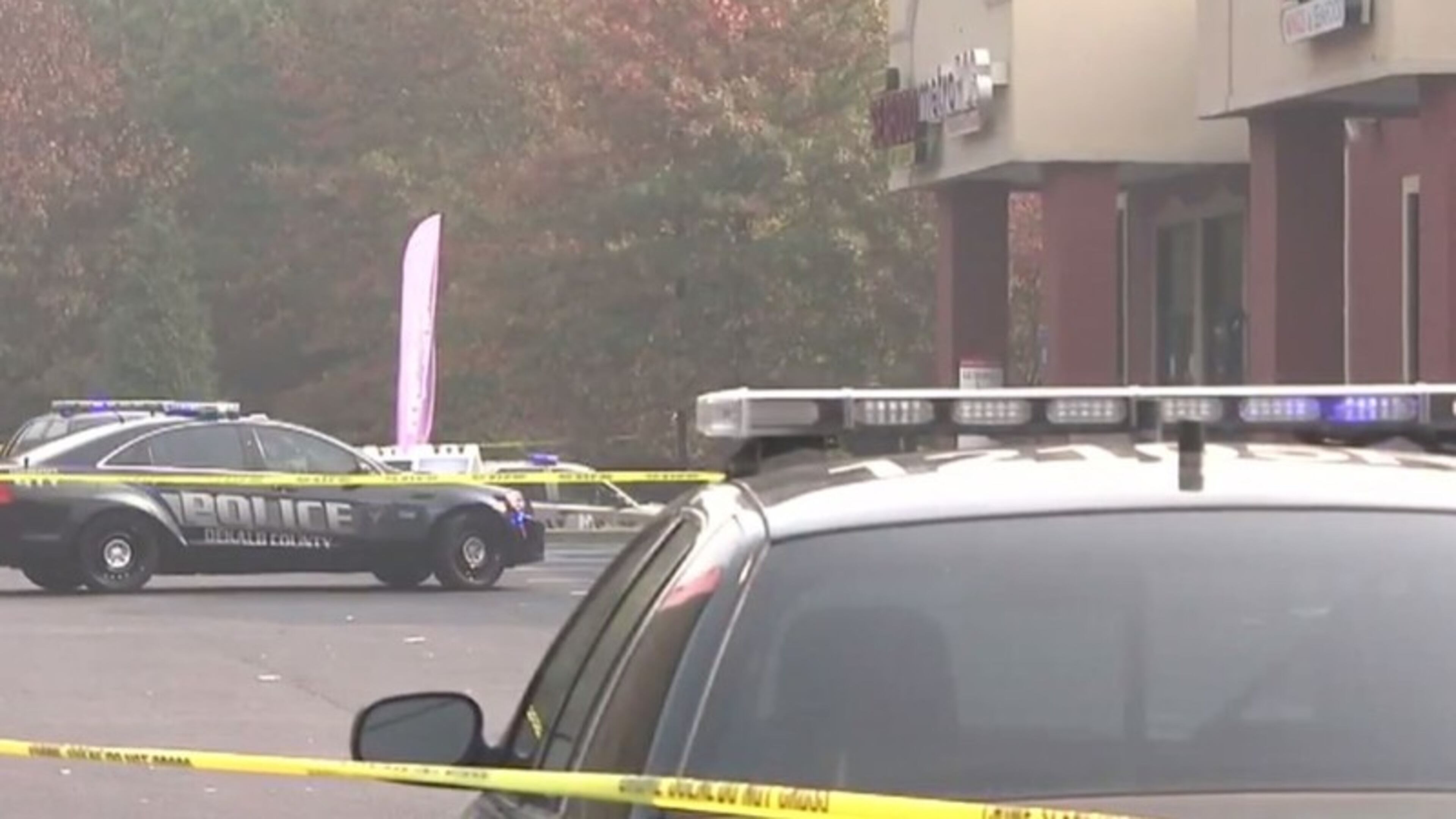 Police say two innocent bystanders were shot during a shootout near a gas station on DeKalb County's Snapfinger Woods Drive. (Credit: Channel 2 Action News)