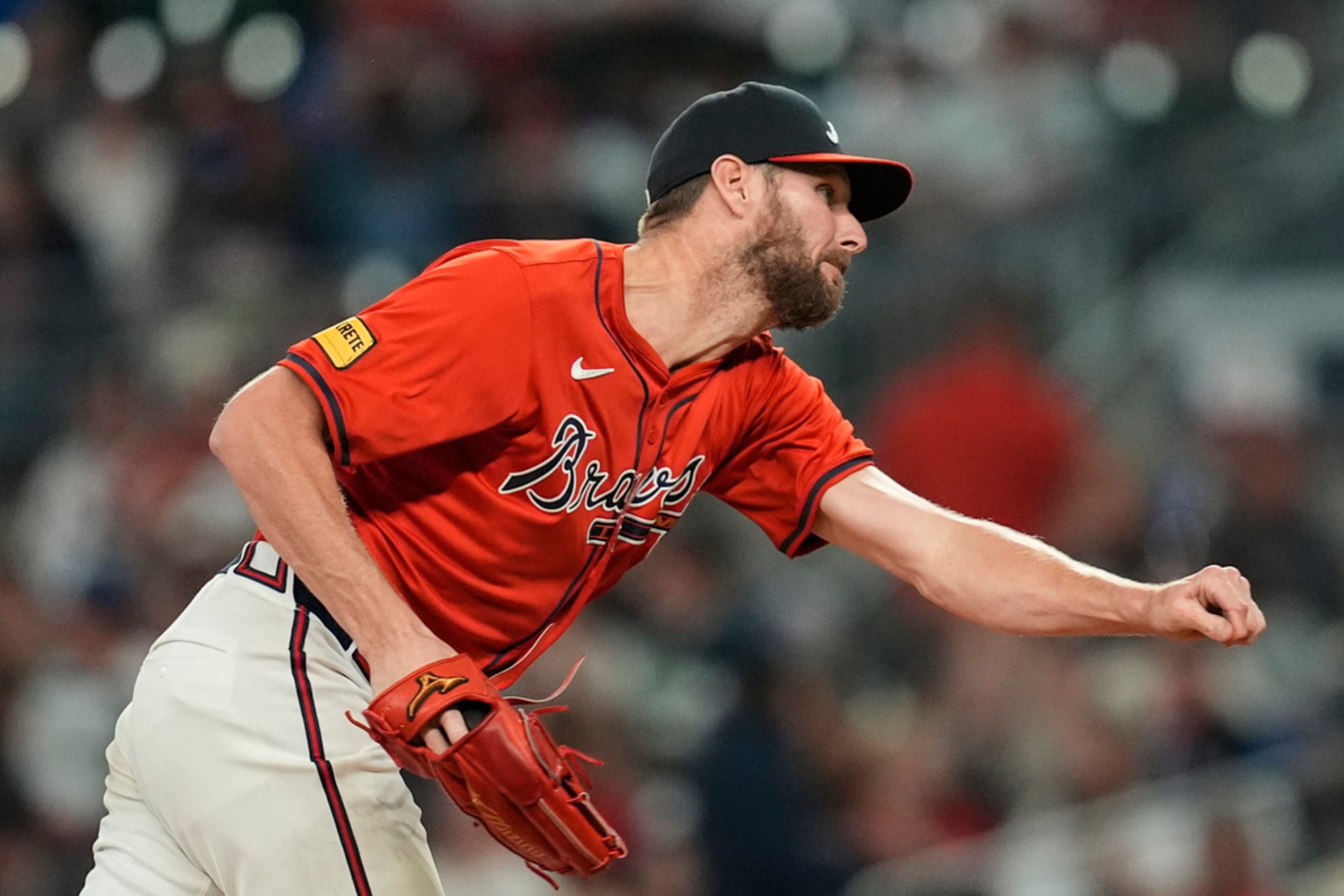 Atlanta Braves pitcher Chris Sale (51) delivers in the seventh inning against the Cleveland Guardians during a baseball game, Friday, April 26, 2024, in Atlanta. (AP Photo/Mike Stewart)