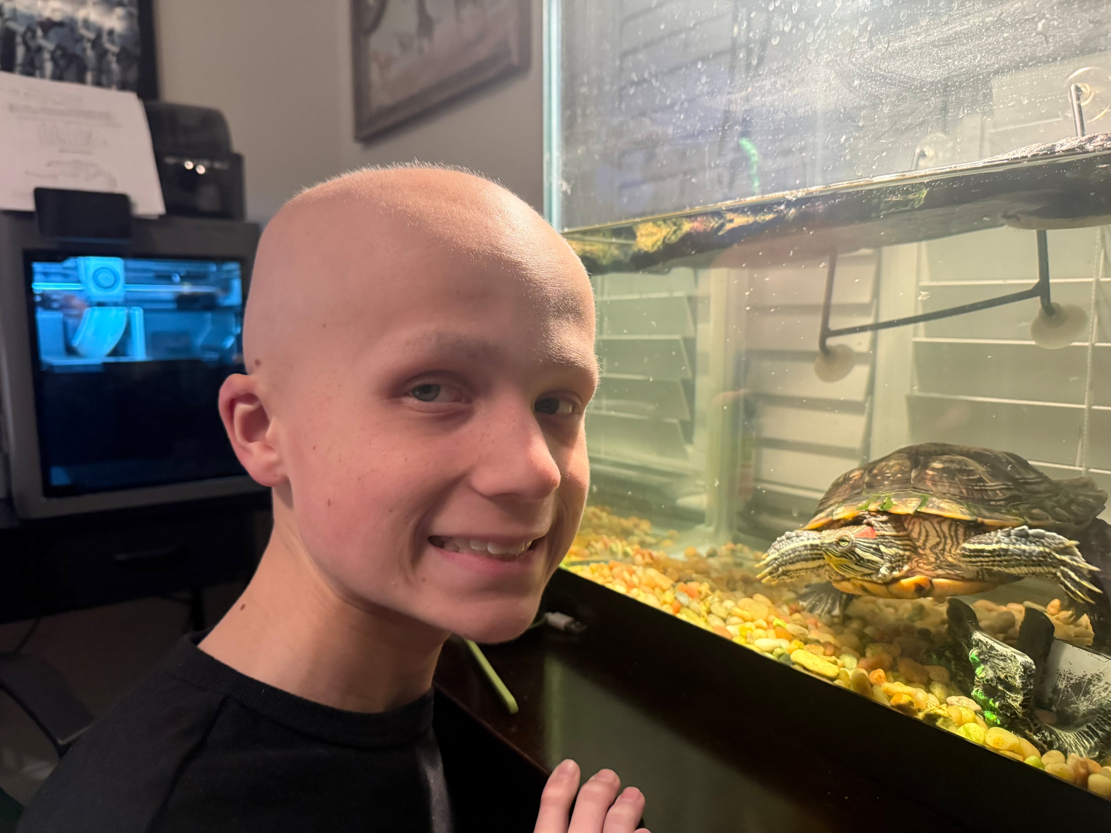 Bowie, 14, was told early on that the one pet he couldn't have was a turtle. But he always liked turtles after watching "Teenage Mutant Ninja Turtles" in the hospital as a 4-year-old. He thinks they're strong. Eventually doctors said it was OK to have one. This is his pet turtle, Timmy. (Courtesy of Meghan Bowie)