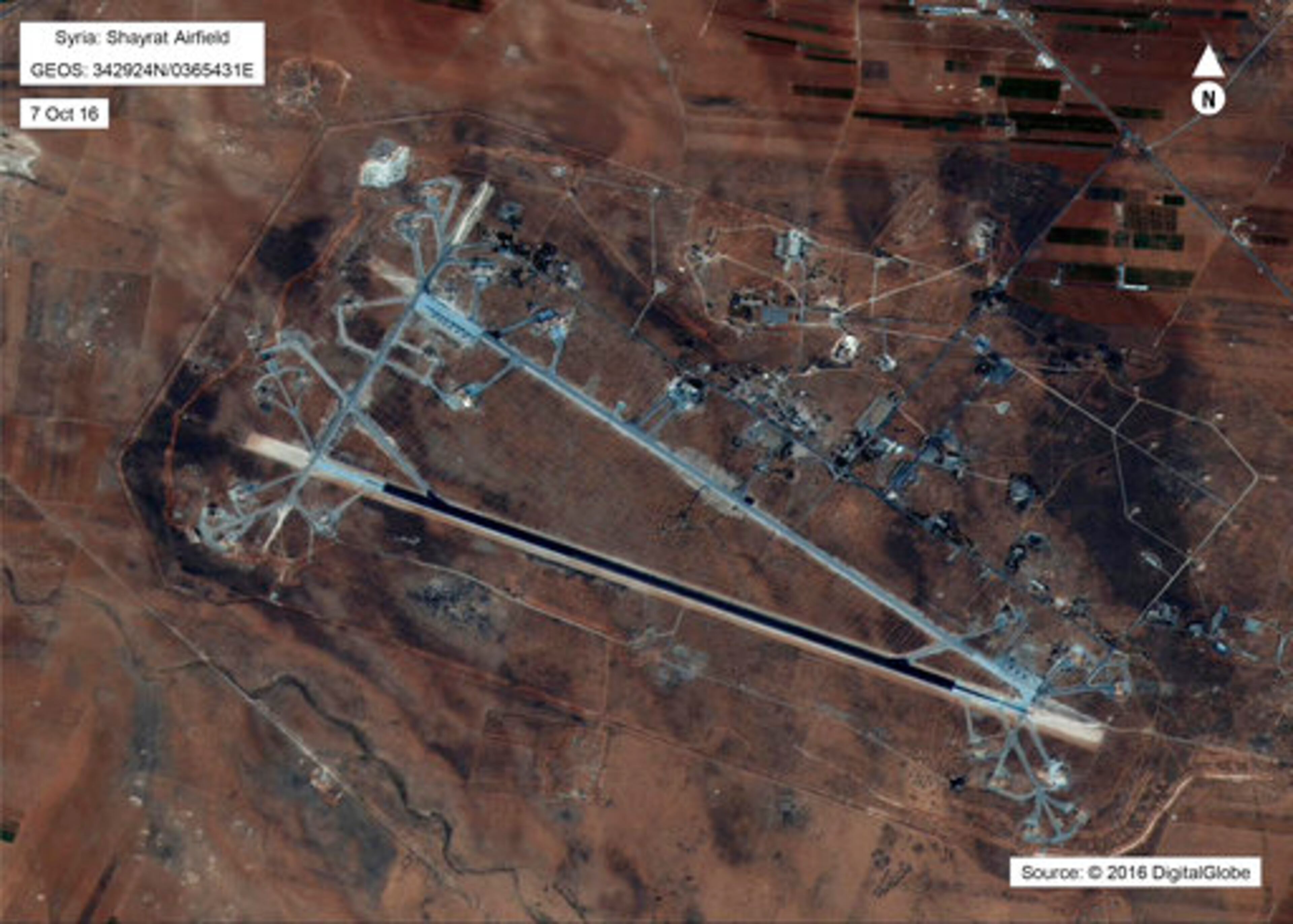 This Oct. 7, 2016 satellite image released by the U.S. Department of Defense shows Shayrat air base in Syria. The United States blasted a Syrian air base with a barrage of cruise missiles on Friday, April 7, 2017 in fiery retaliation for this week's gruesome chemical weapons attack against civilians. (DigitalGlobe/U.S. Department of Defense via AP)