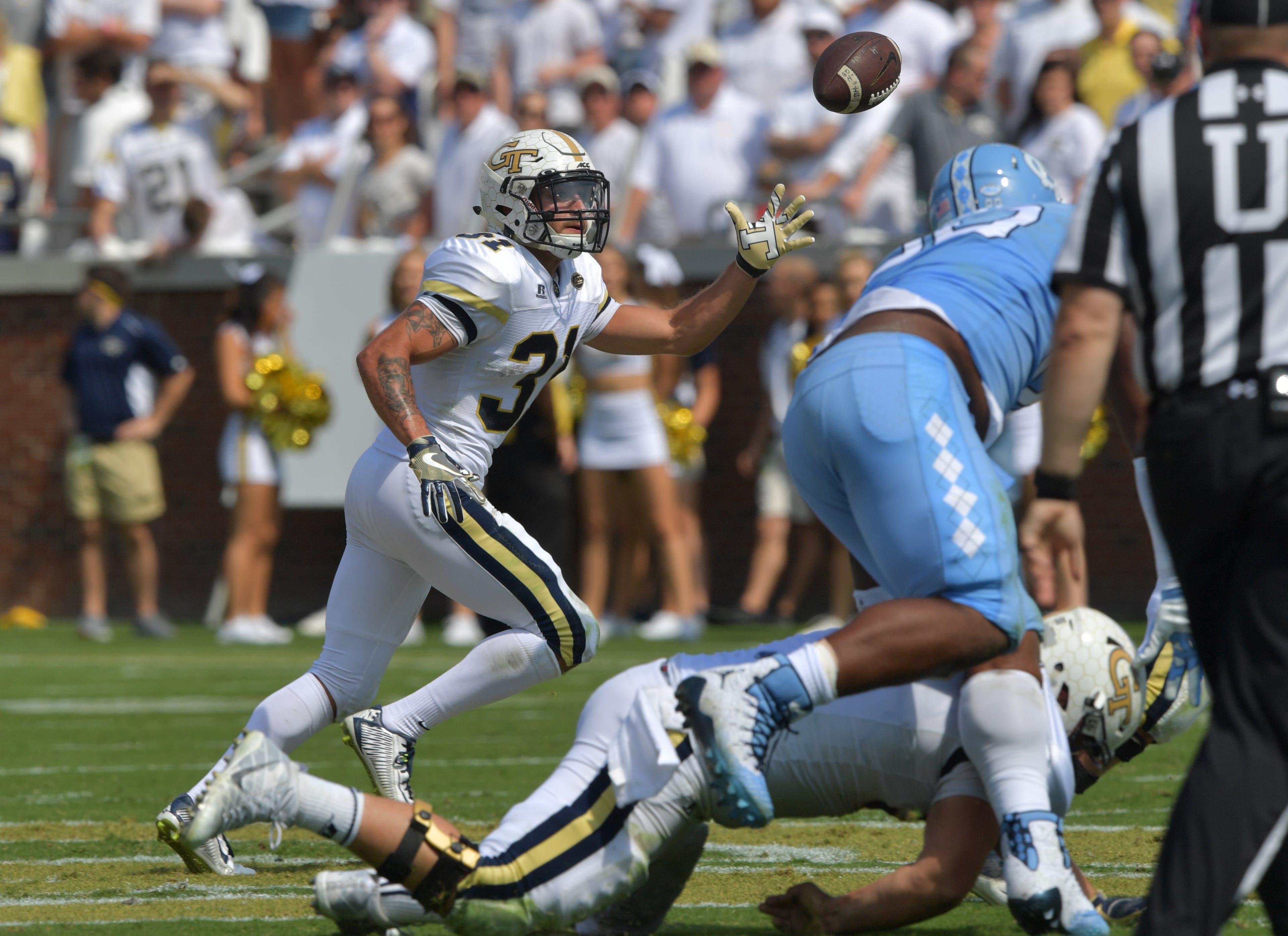 September 30, 2017 Atlanta - Georgia Tech running back Nathan Cottrell (31) catches a pass from quarterback TaQuon Marshall (16) in the first half of an NCAA college football game against the North Carolina at Bobby Dodd Stadium on Saturday, September 30, 2017. HYOSUB SHIN / HSHIN@AJC.COM