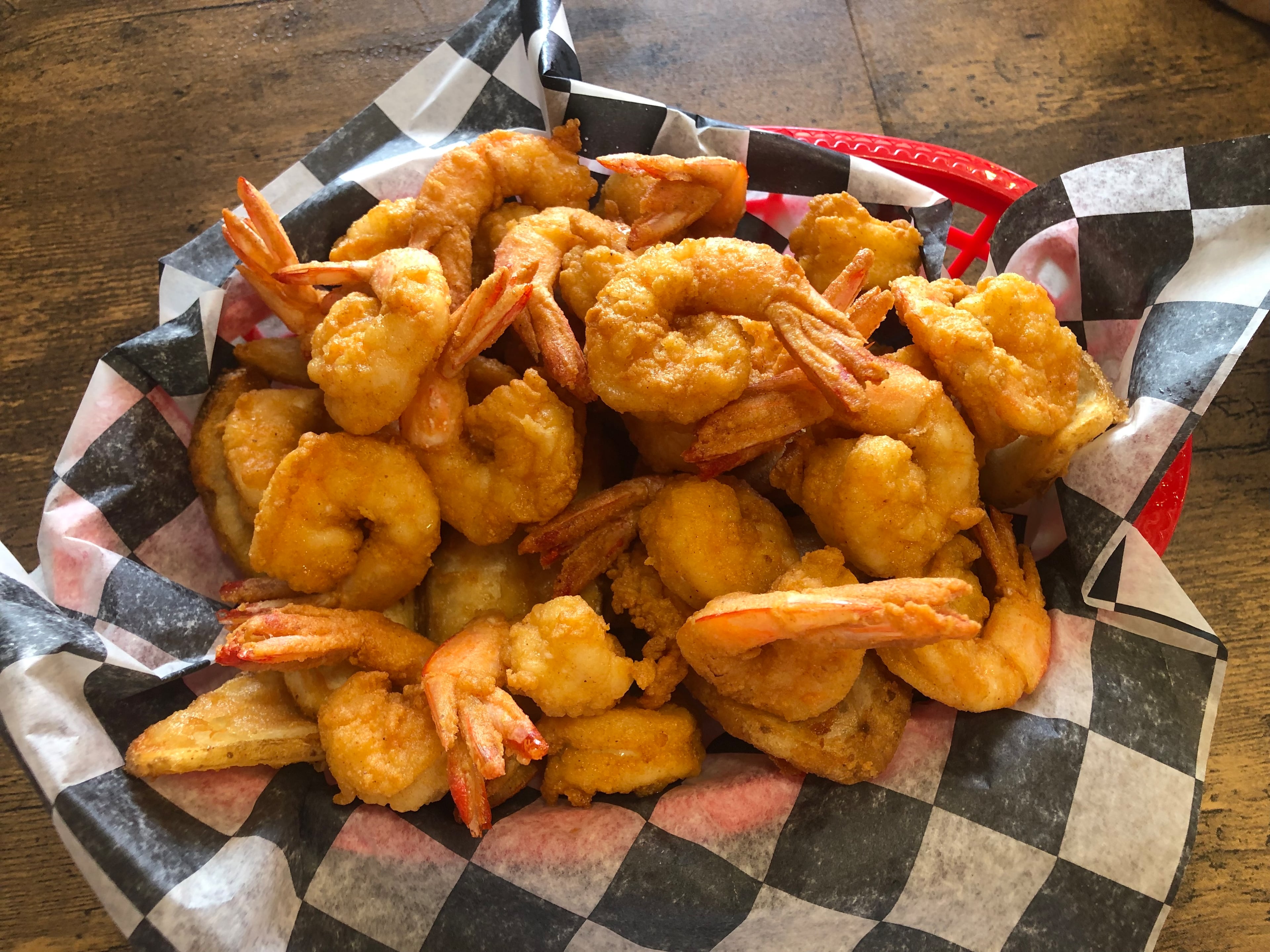 The shrimp basket at B&J's Steak and Seafood includes a half pound of shrimp fried, grilled, blackened or boiled. (Bill Dawers for the AJC)