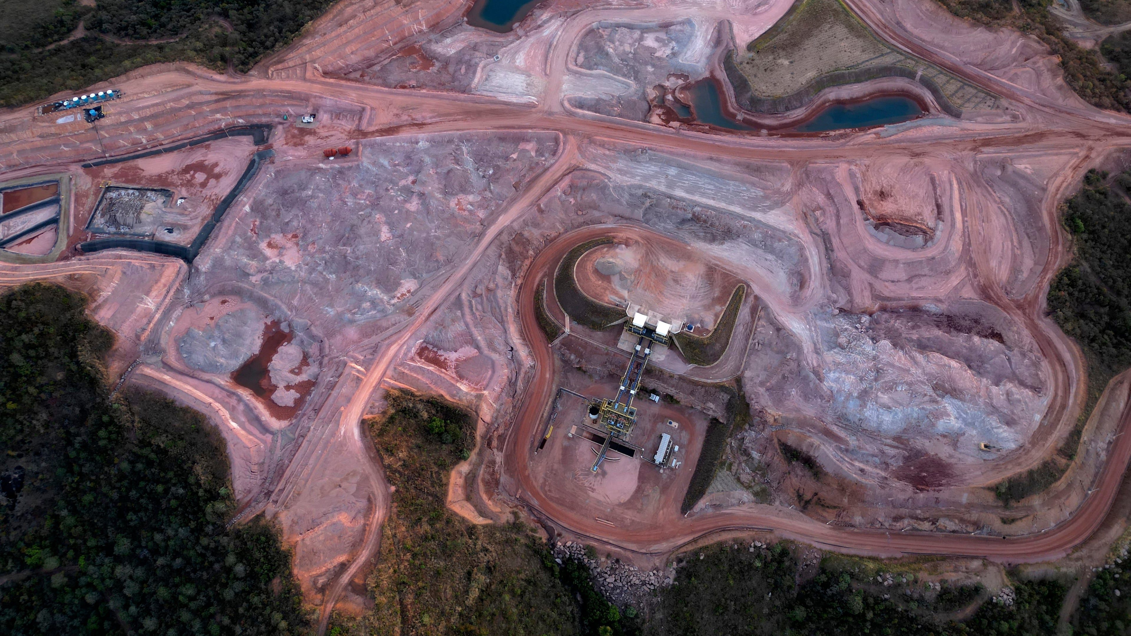 FILE - A mine operated by Serra Verde Mining digs for rare earth elements including neodymium, praseodymium, terbium and dysprosium, which are essential for the production of permanent magnets, in Minacu, Goias state, Brazil, July 28, 2025. (AP Photo/Eraldo Peres, File)