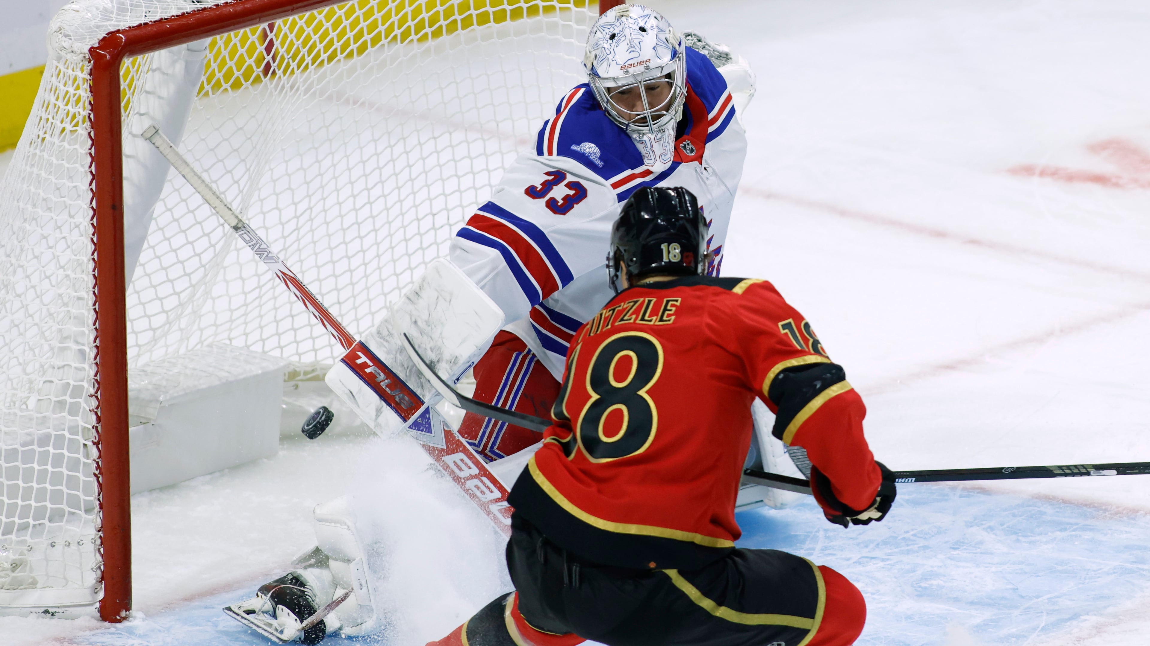 Ottawa Senators' Tim Stutzle (18) scores against New York Rangers goaltender Dylan Garand (33) during the first period of an NHL hockey game in Ottawa, Ontario, Saturday, Oct. 24, 2026. (Patrick Doyle/The Canadian Press via AP)