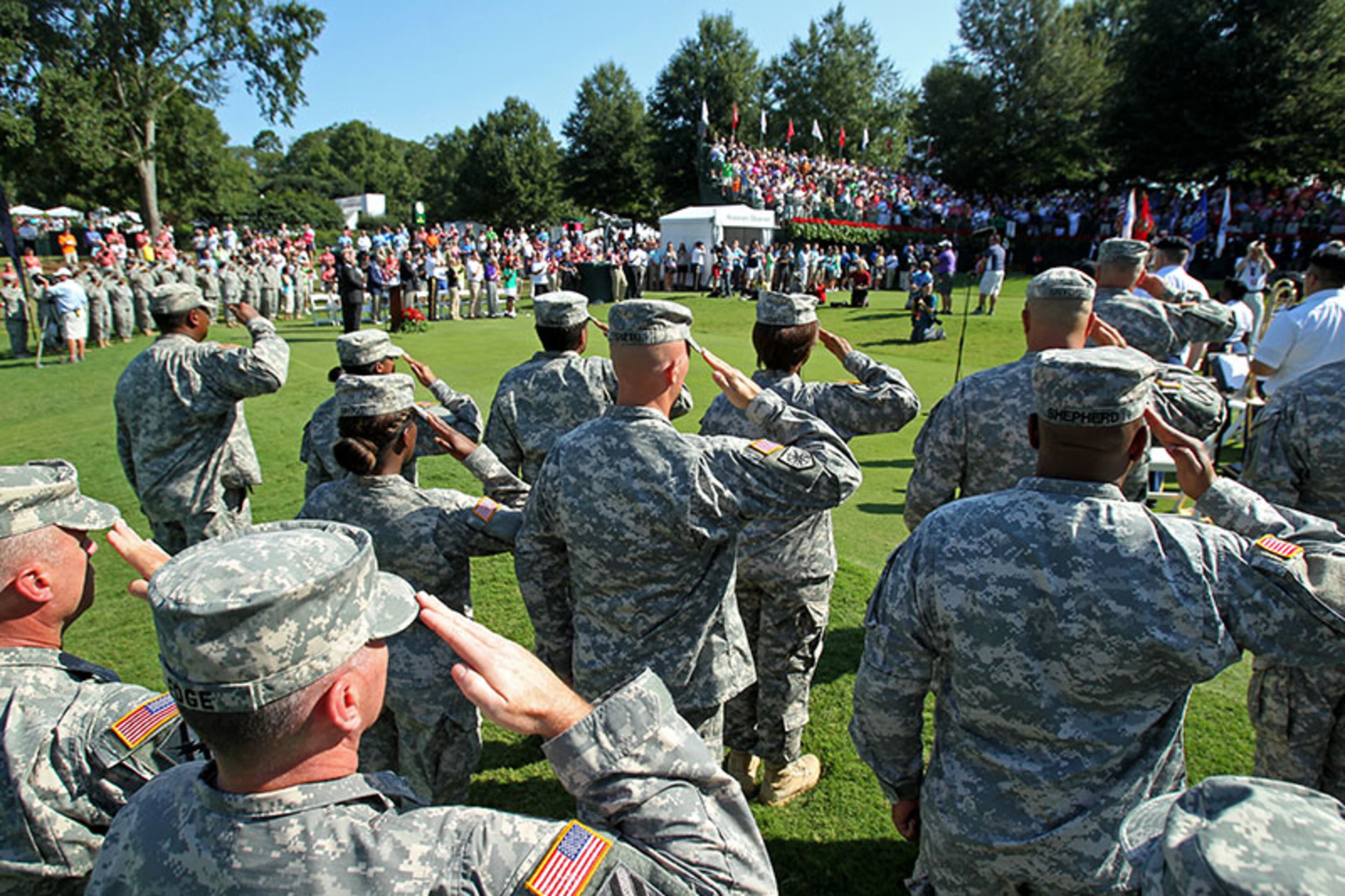 Members of the U.S. Army salute during the presentation of the colors during the opening ceremony of the 2013 Tour Championship at East Lake Golf Club Thursday in Atlanta.