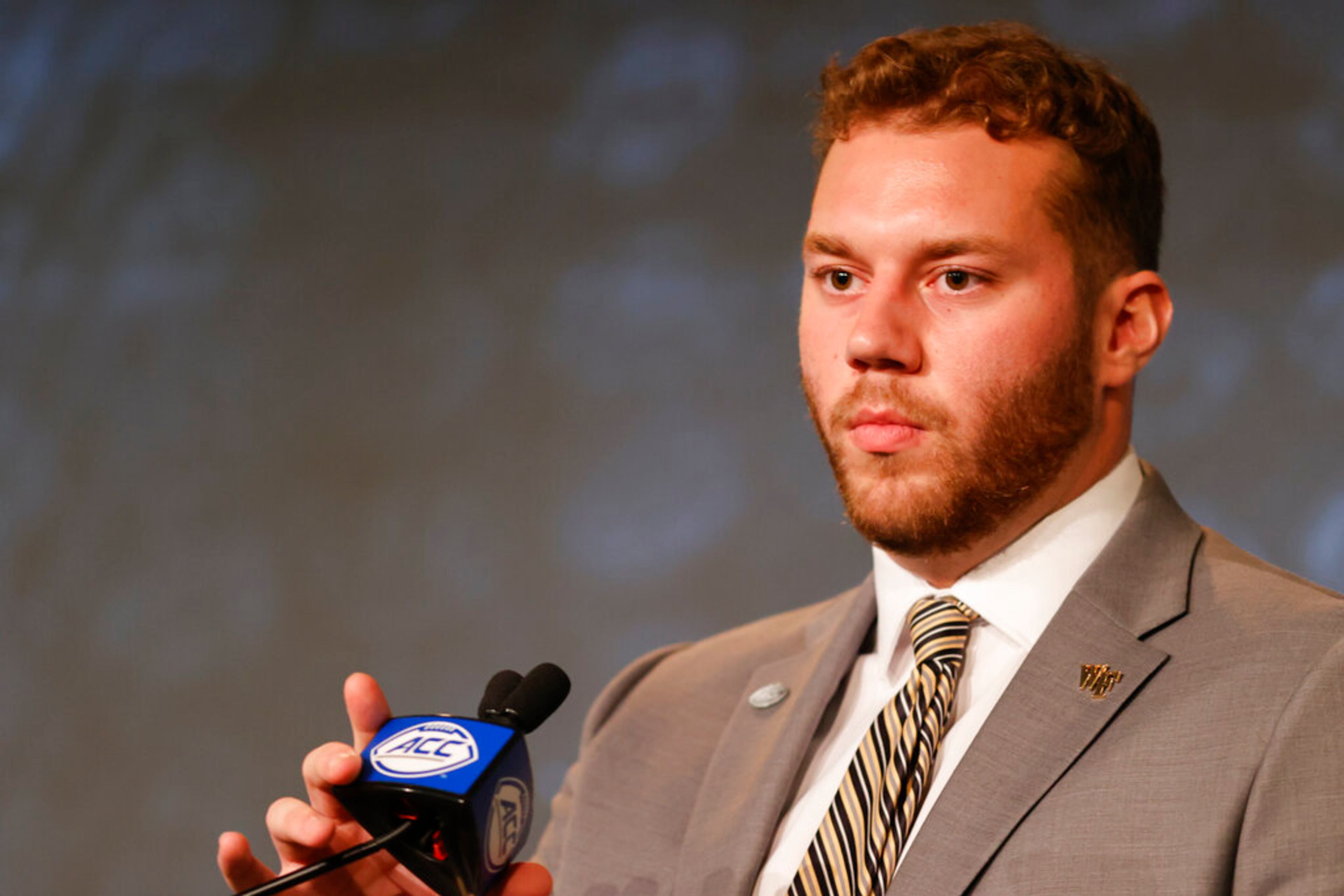 Wake Forest offensive lineman Michael Jurgens answers a question at the NCAA college football Atlantic Coast Conference Media Days in Charlotte, N.C., Wednesday, July 20, 2022. (AP Photo/Nell Redmond)