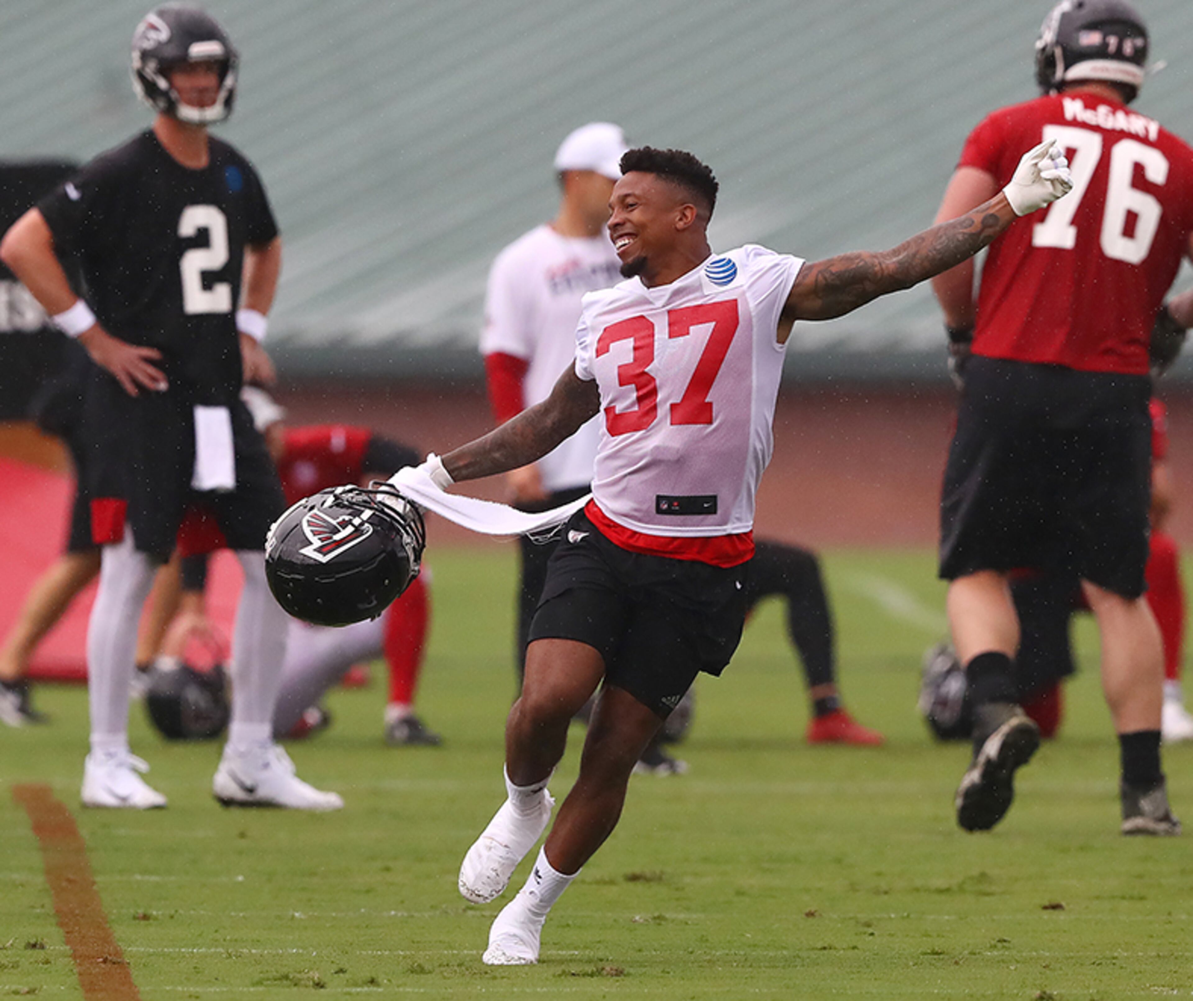Falcons safety Ricardo Allen joyfully reacts to an interception during the second day of training camp Tuesday, July 23, 2019, in Flowery Branch.