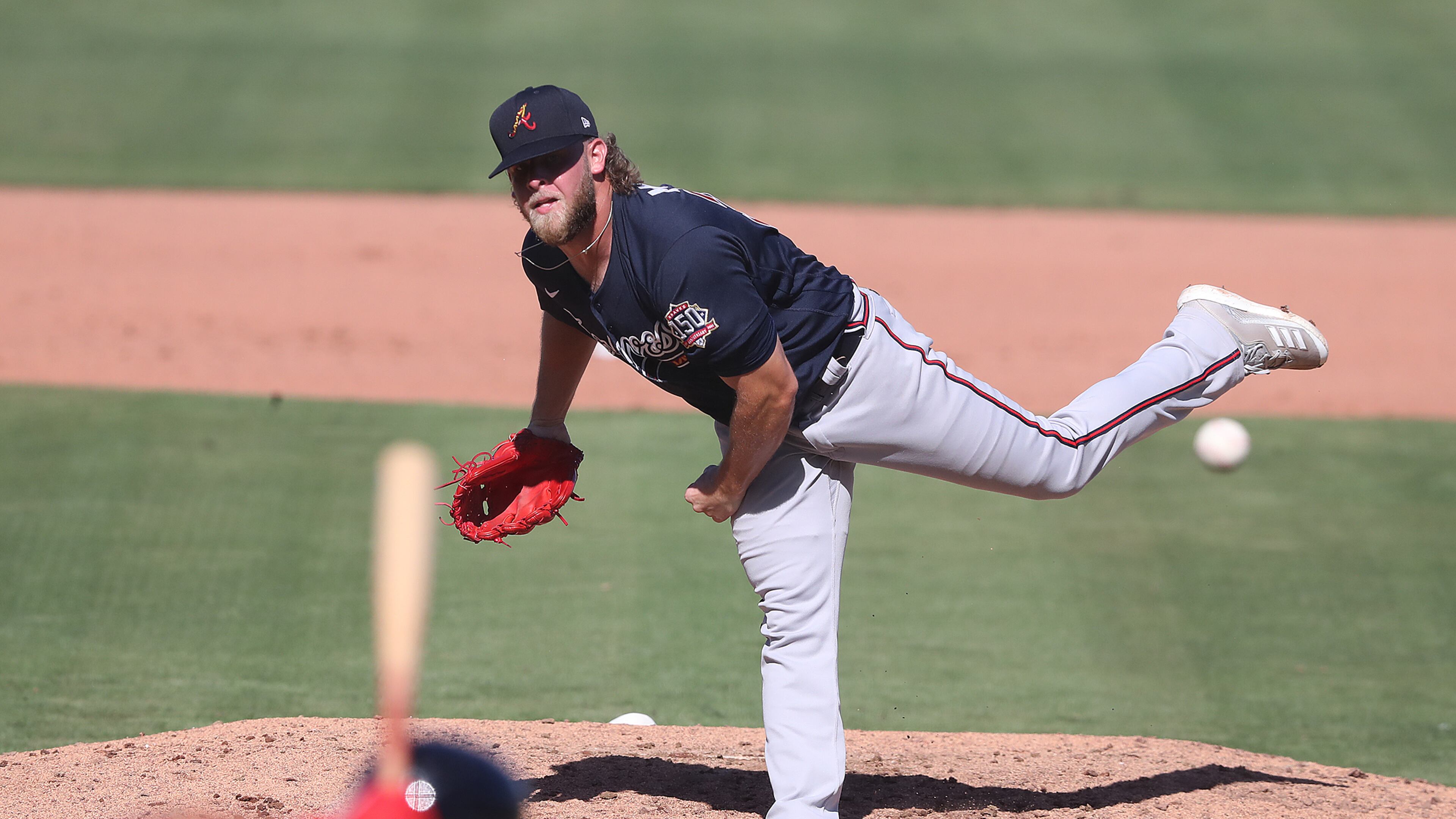 Atlanta Braves reliever A.J. Minter delivers against the Boston Red Sox during the fifth inning Monday, March 1, 2021, at JetBlue Park in Fort Myers, Fla. (Curtis Compton / Curtis.Compton@ajc.com)