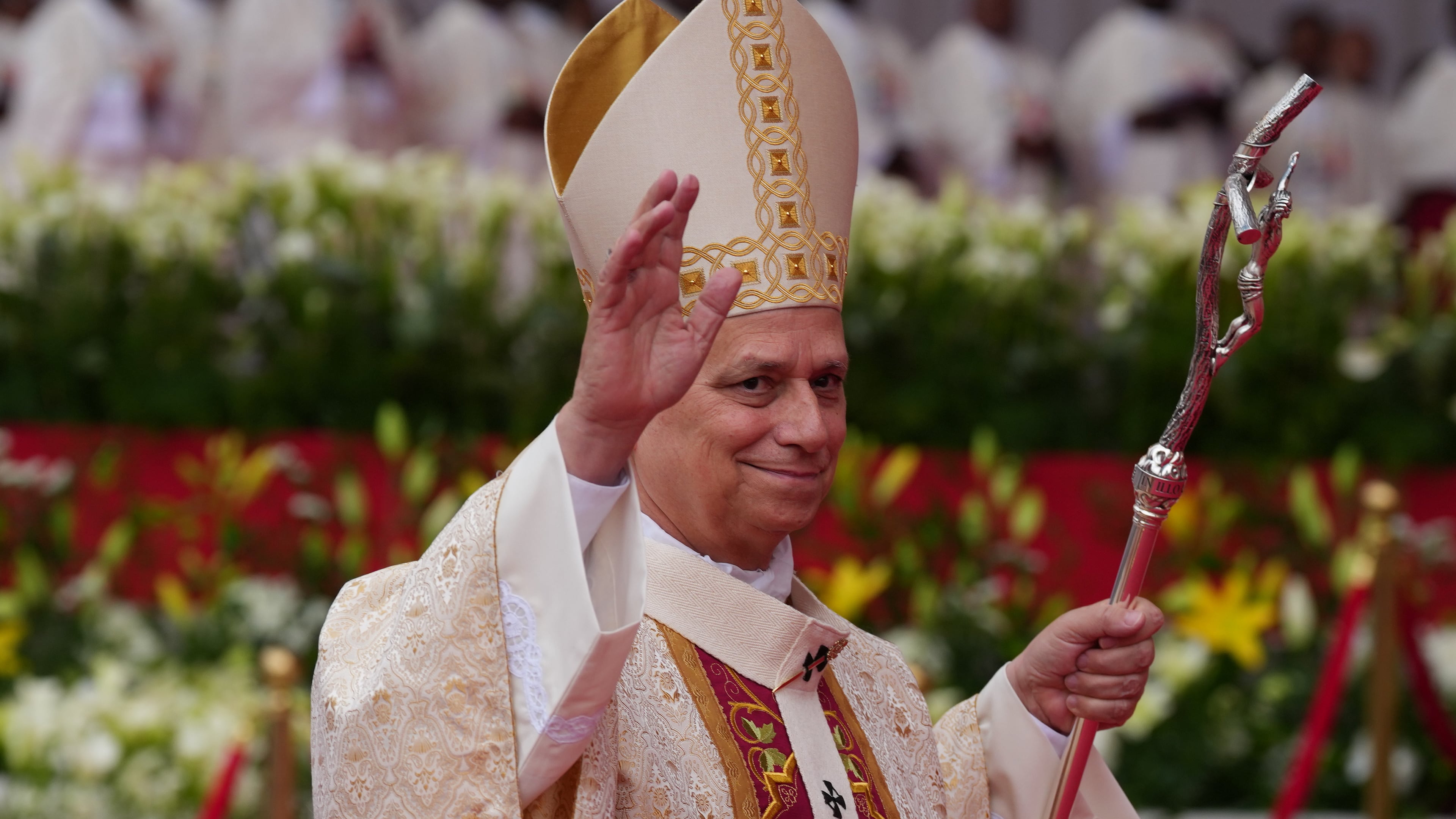 Pope Leo XIV arrives to celebrate the Holy mass at the Malabo stadium, in Malabo, Equatorial Guinea, Thursday, April 23, 2026, on the last day of his 11-day pastoral visit to Africa. (AP Photo/Misper Apawu)
