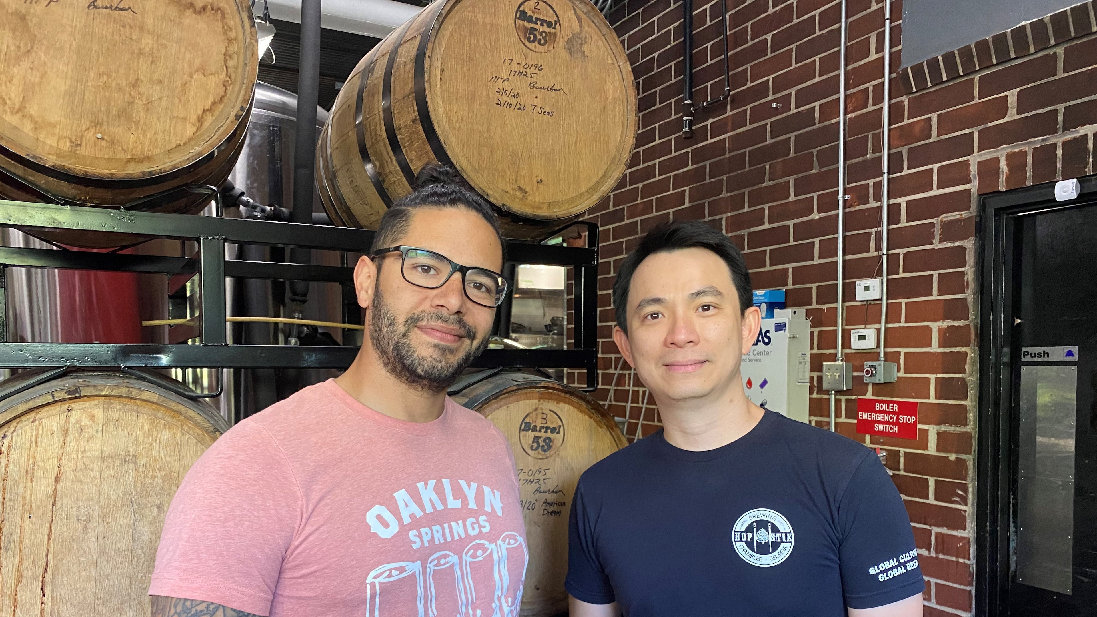 Hopstix brewer Justin Ramirez (left) and owner Andy Tan are selecting some barrel-aged beers for the 5th anniversary celebration.
Bob Townsend for The Atlanta Journal-Constitution