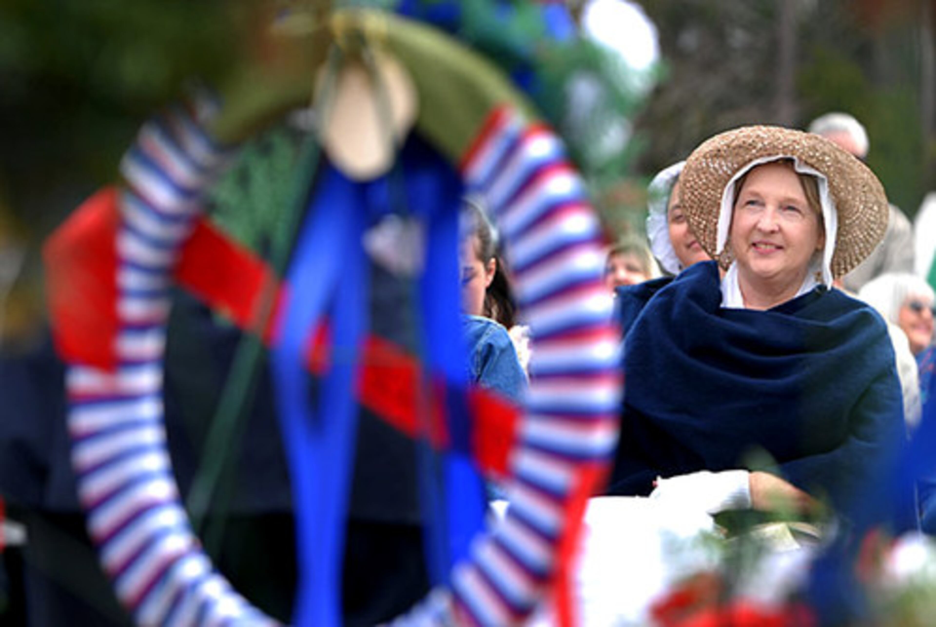 First Vice Regent, Augustin Clayton Chapter of the National Society of the Daughters of the American Revolution, Lynn Dorney smiles during the ceremony.