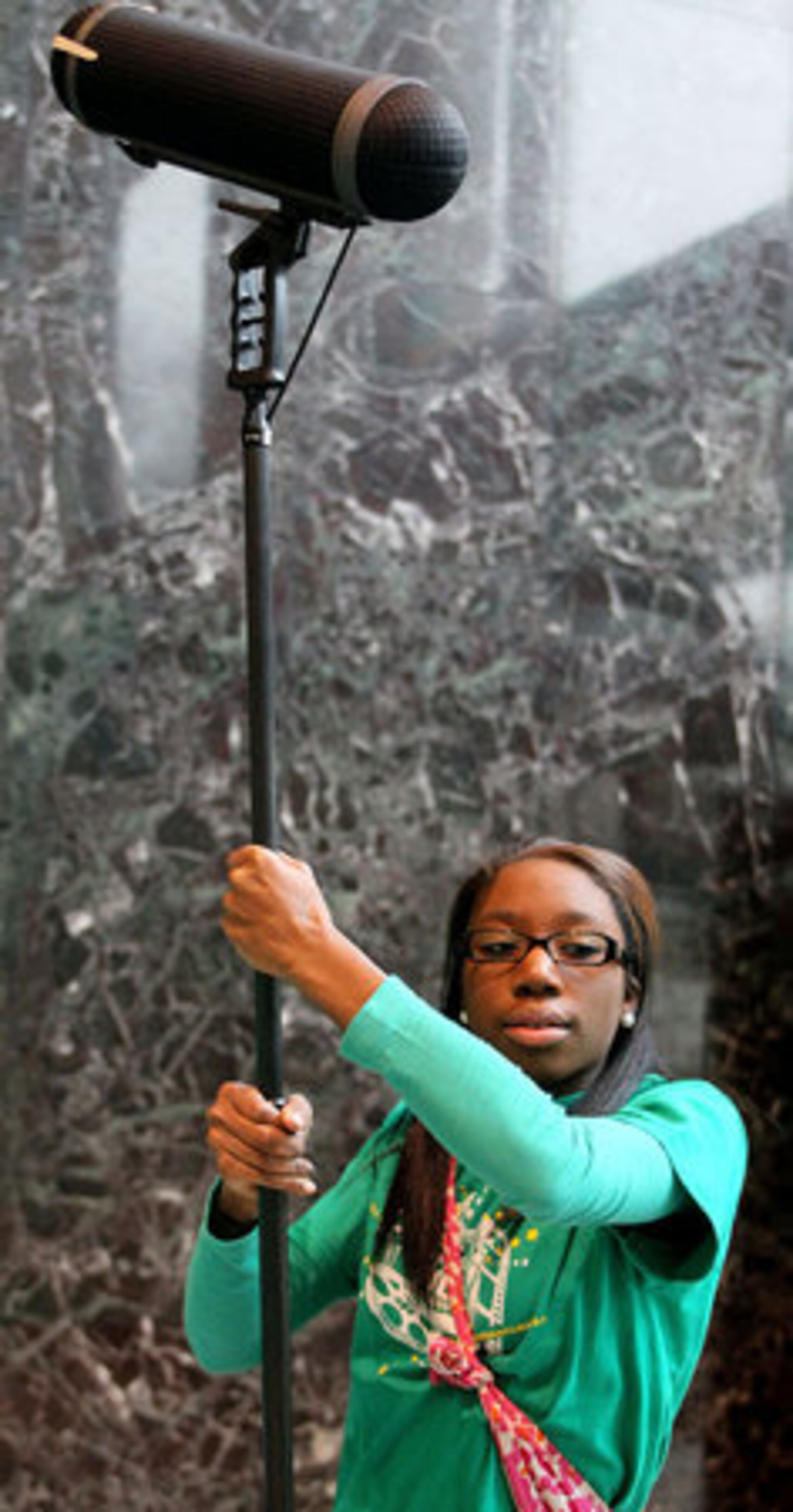 Atlantan Kashmere Gray operates the microphone as high school and college students rehearse scenes for their Sprite Refreshing Films project.