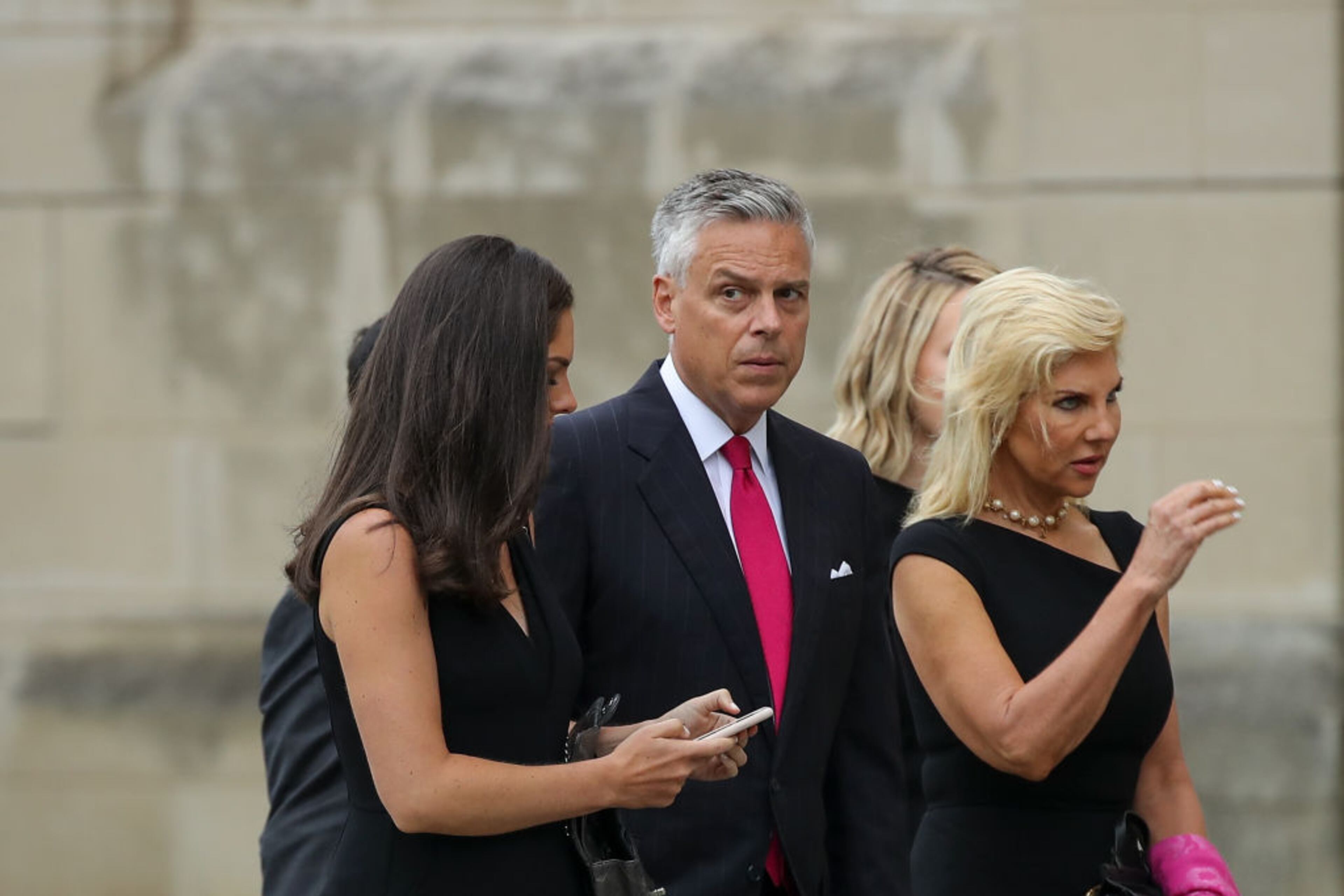 WASHINGTON, DC - SEPTEMBER 1: Jon Huntsman, U.S. Ambassador to Russia, arrives with family at the Washington National Cathedral for the funeral service for the late Senator John McCain, September 1, 2018 in Washington, DC. Former presidents Barack Obama and George W. Bush are set to deliver eulogies for McCain in front of the 2,500 invited guests. McCain will be buried on Sunday at the U.S. Naval Academy Cemetery. (Photo by Drew Angerer/Getty Images)