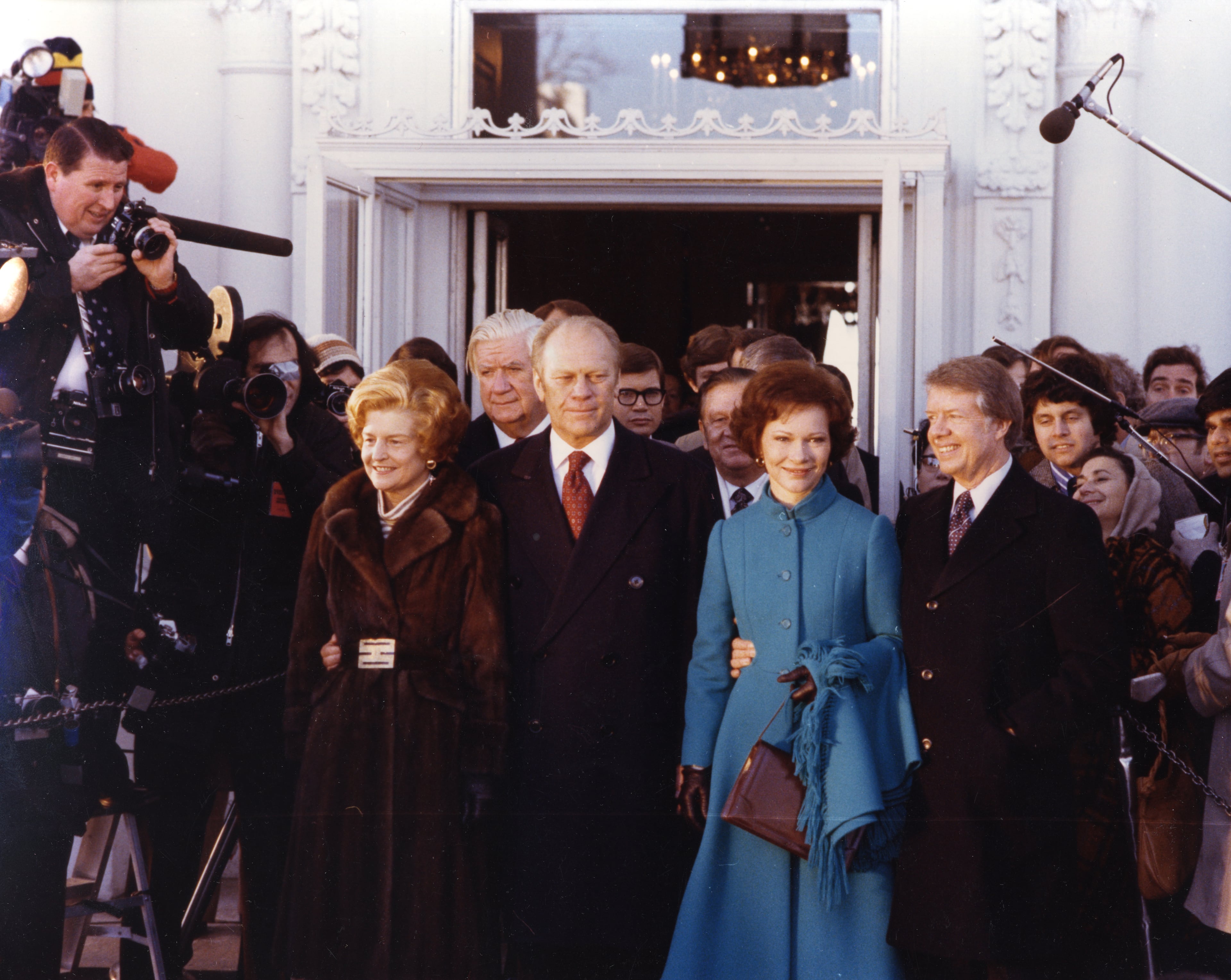 1977: Jimmy and Rosalynn Carter are all smiles at Jimmy's Presidential Inauguration. At their side is the outgoing President Gerald Ford and his wife Betty. (AJC file)