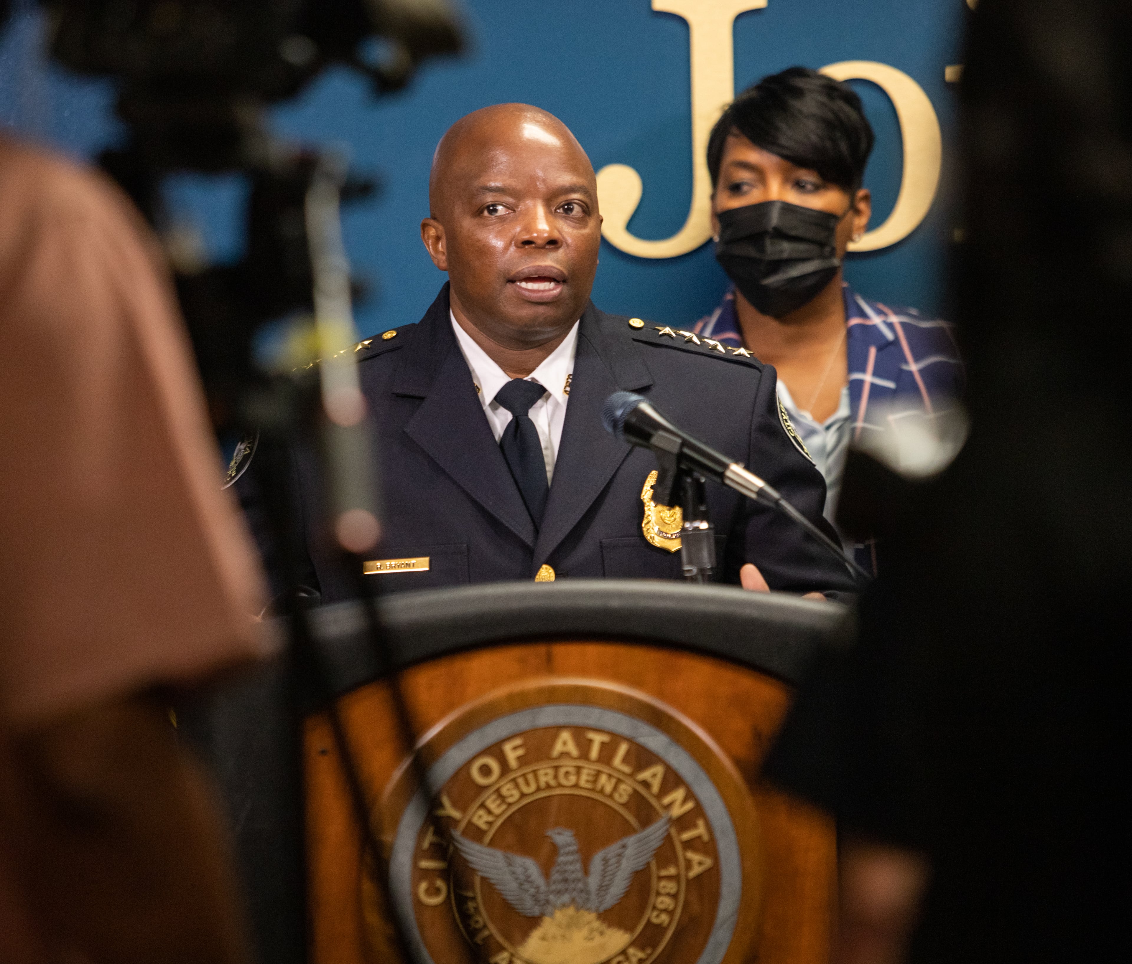 Bryant served there until he was named the department’s interim chief in June 2020 following the resignation of former Chief Erika Shields, who stepped down the day after Rayshard Brooks was shot and killed by an APD officer. Nearly a year later, he was named permanent chief by former Mayor Keisha Lance Bottoms (right) as the city grappled with a spike in killings.