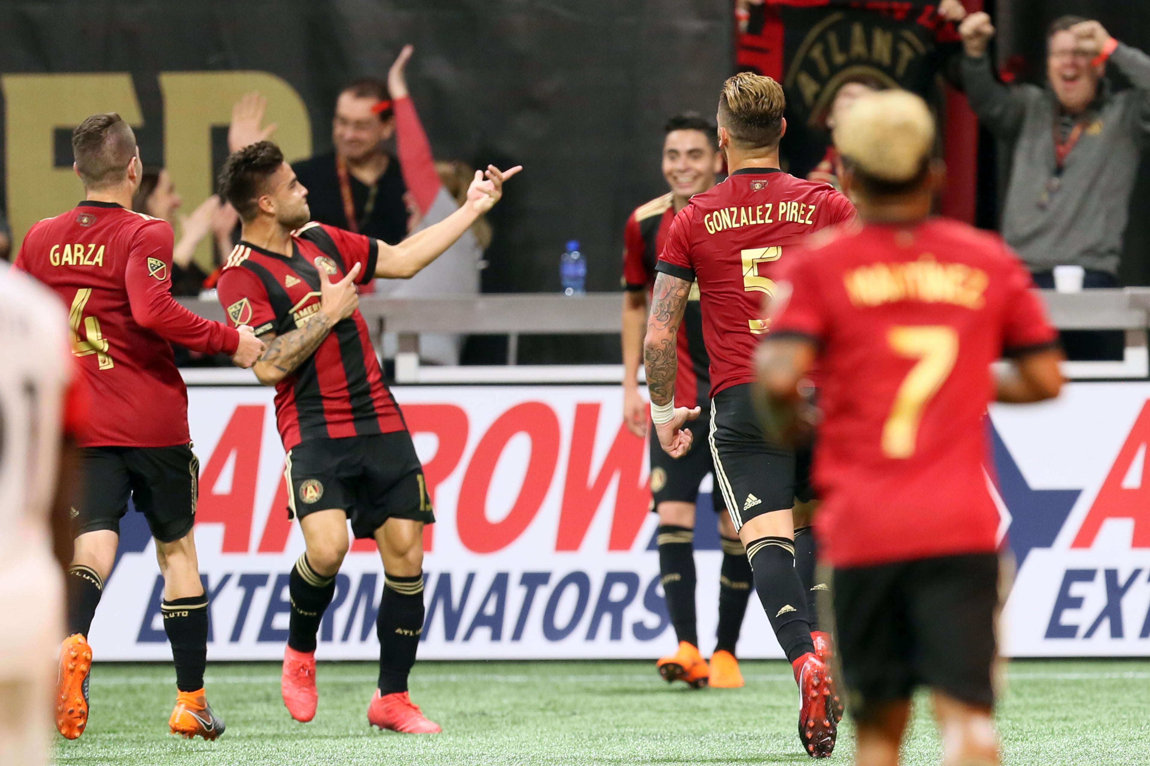 March 11, 2018. Hector 'Tito' Villalba reacts with his team mates after scoring the third goal of the team, Atlanta United beat the DC United 3 to 1 on March 11, 2018 in Atlanta Ga, at Mercedes-Benz stadium.