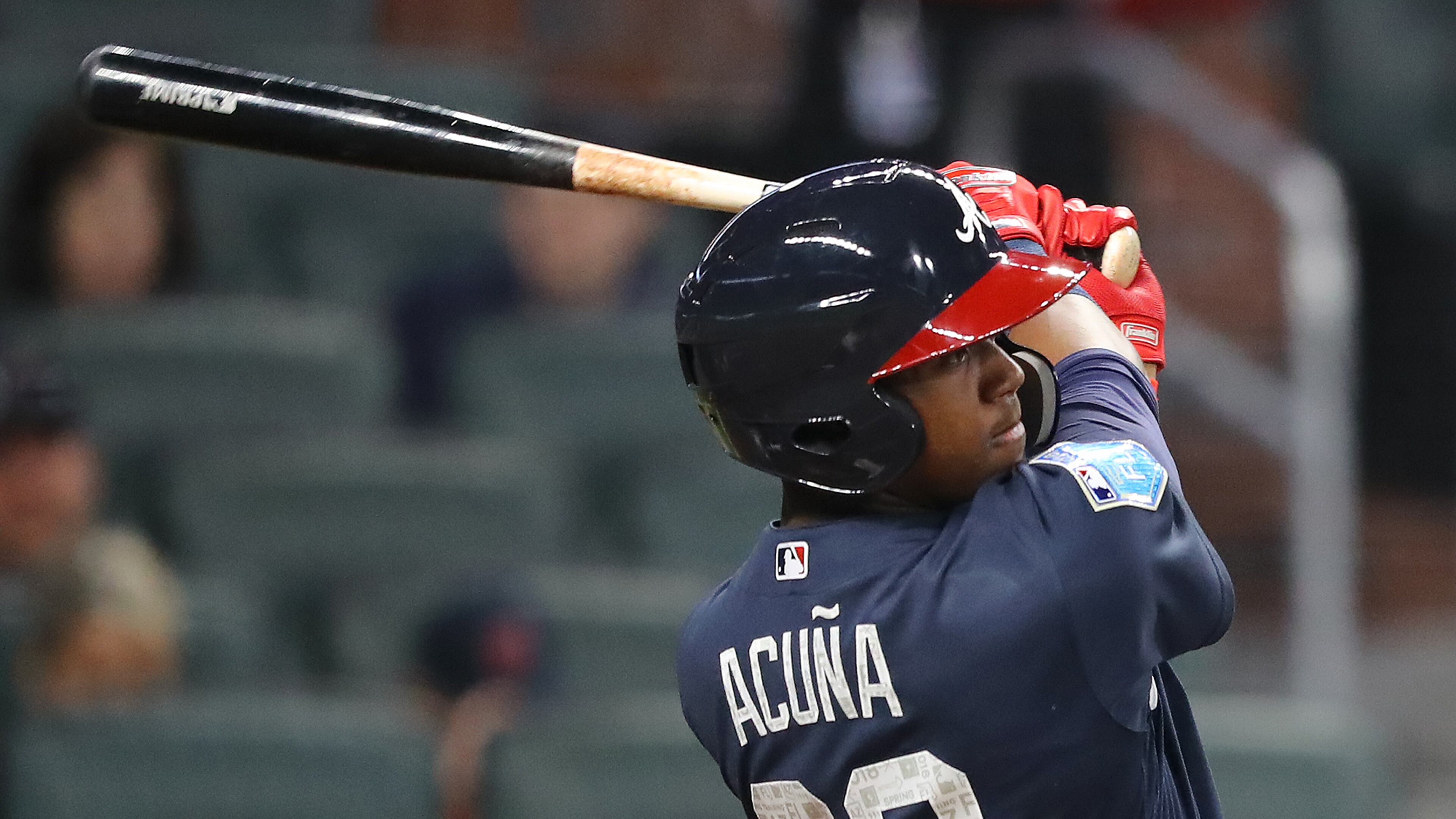 Ronald Acuna singles in the Braves Future Stars exhibition game - that sweet swing will make its Major League debut soon enough. (Curtis Compton/ccompton@ajc.com)