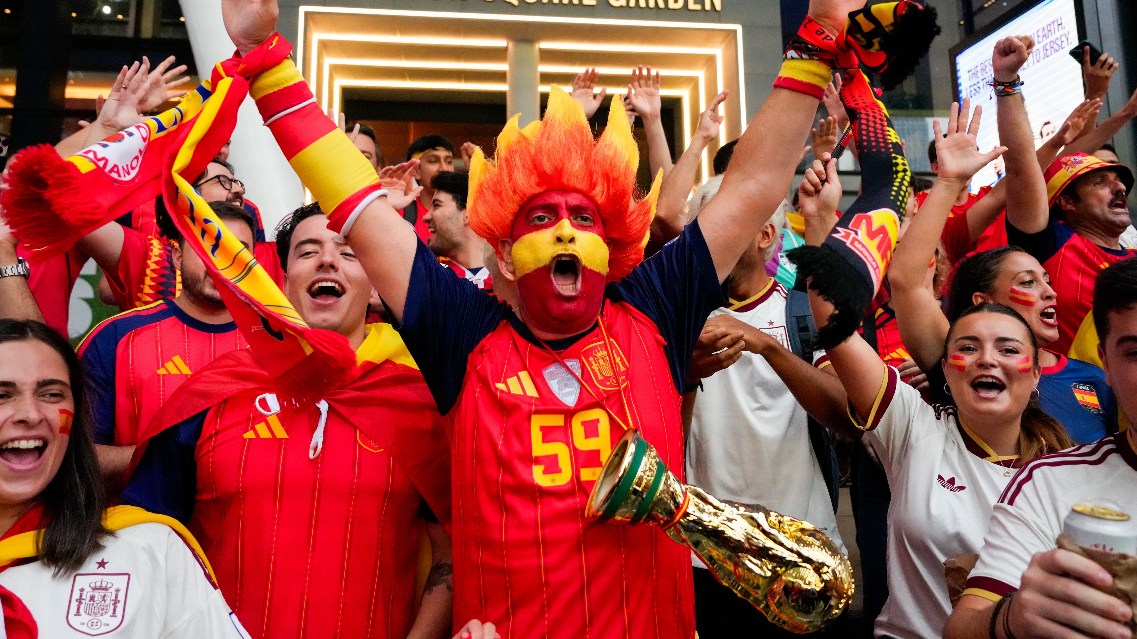 Spain fans gather for a rally on the eve of the World Cup final soccer match in New York's Times Square, Saturday, July 18, 2026 (AP Photo/Yuki Iwamura)
