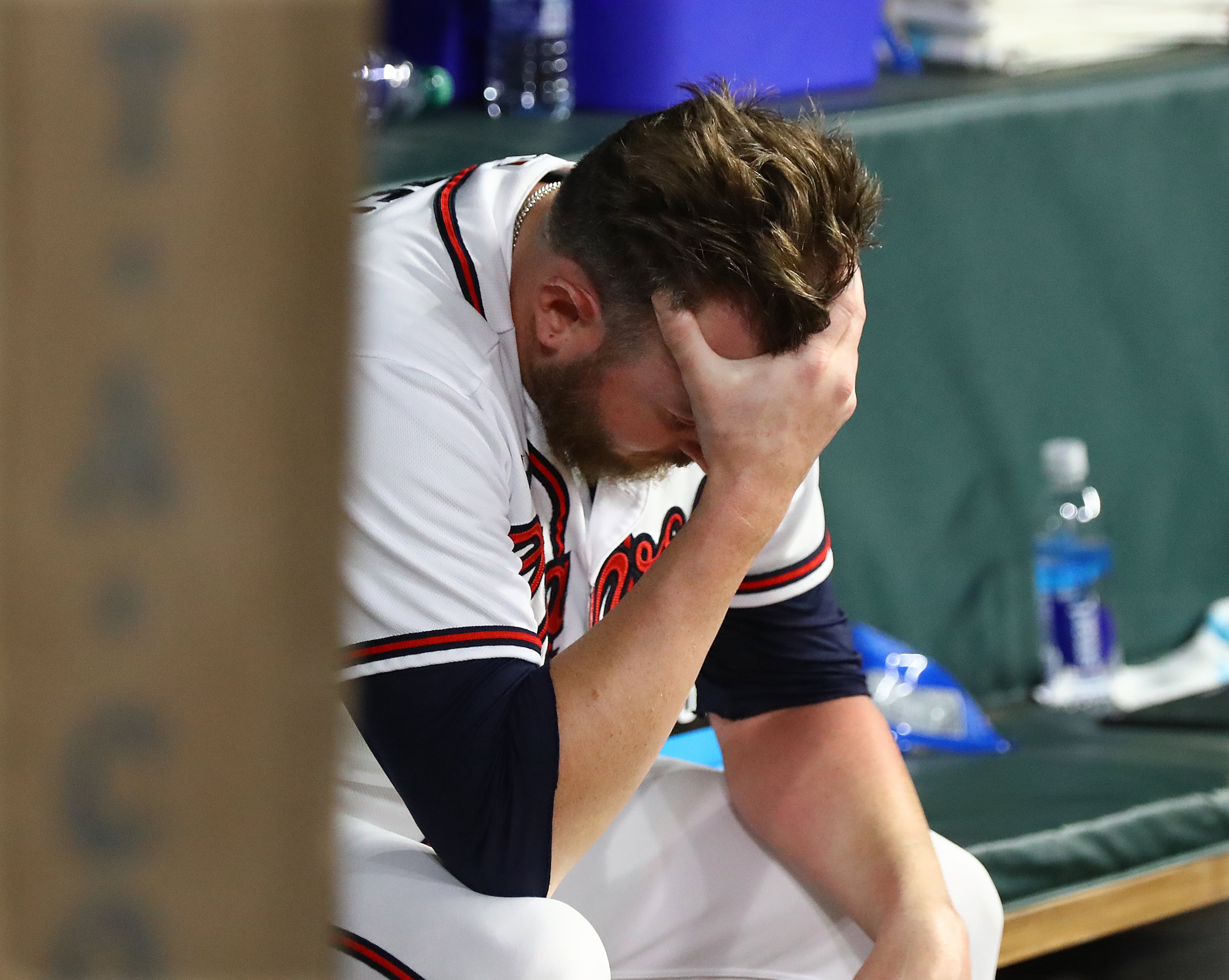 Braves pitcher Tyler Matzek sits dejected in the dugout after giving up three runs including a 2-run homer to Chicago Cubs Patrick Wisdom for a 6-3 loss to the Cubs during the 10th inning in a MLB baseball game on Wednesday, April 27, 2022, in Atlanta. The Braves lost 6-3. “Curtis Compton / Curtis.Compton@ajc.com”