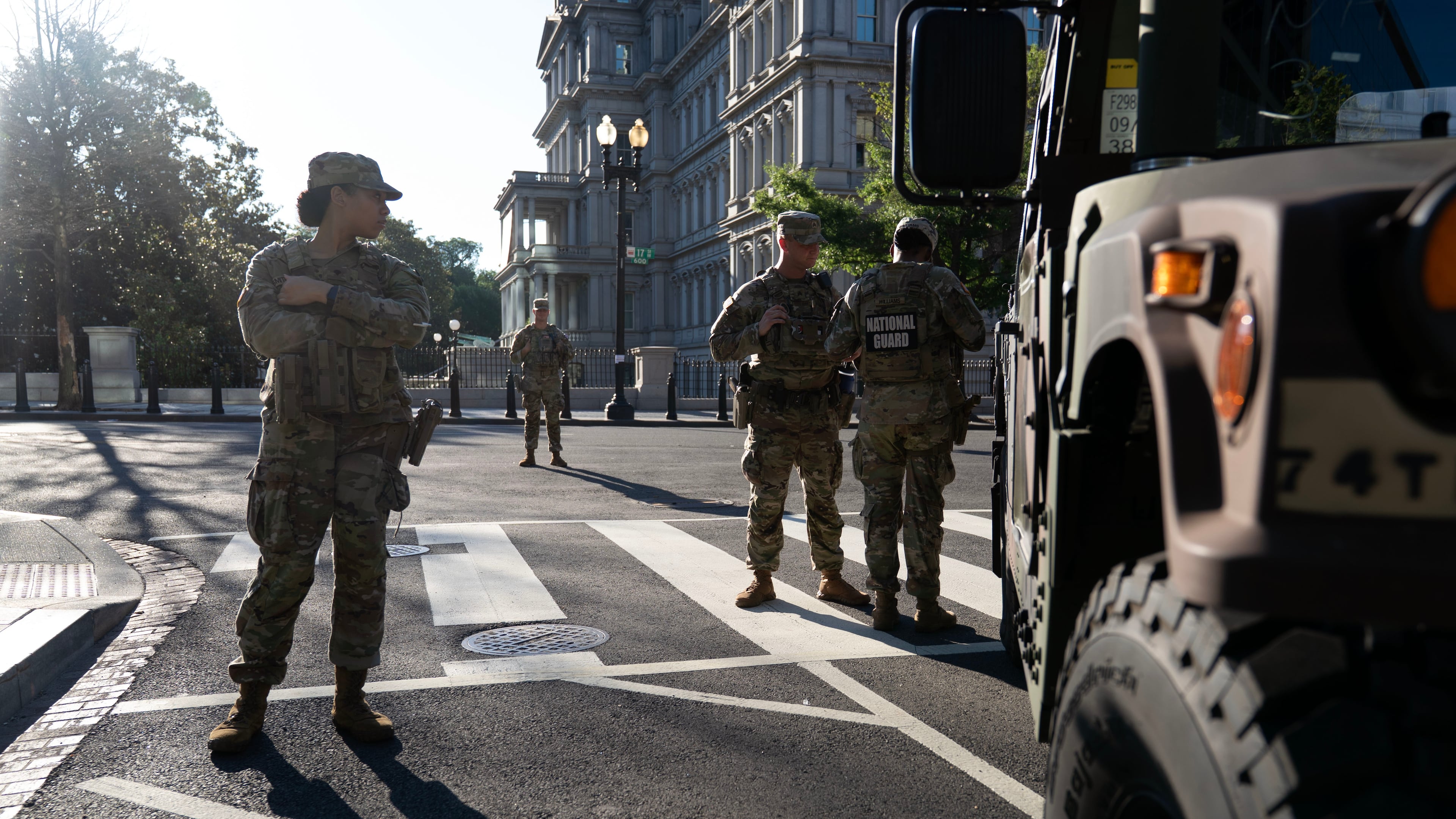 Members of the National Guard stands guard the streets near the White House complex Saturday, June 13, 2026, in Washington. (AP Photo/Jose Luis Magana)