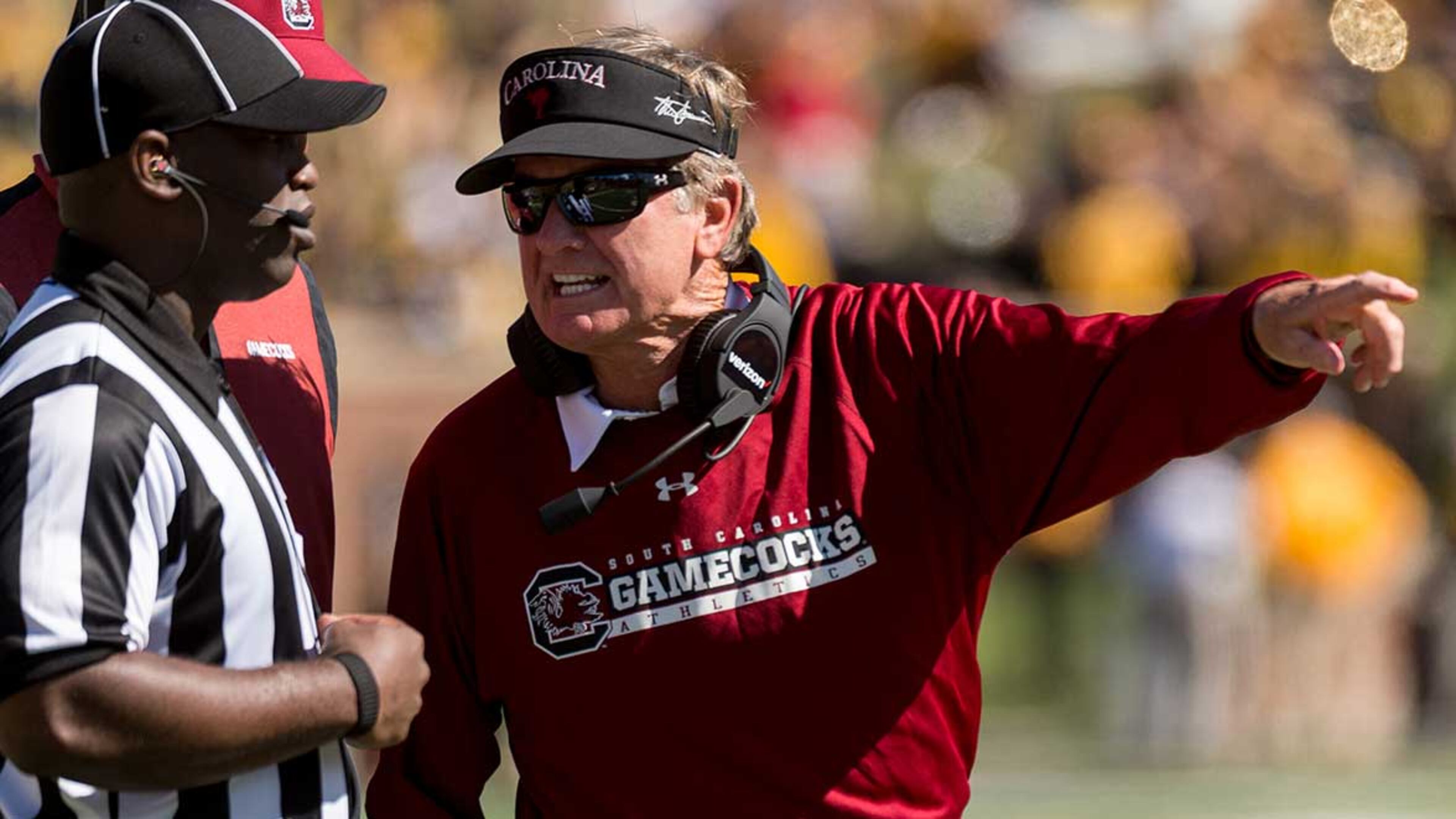 Former South Carolina and Florida coach Steve Spurrier will be one of 13 players and coaches to enter the College Football Hall of Fame in December.