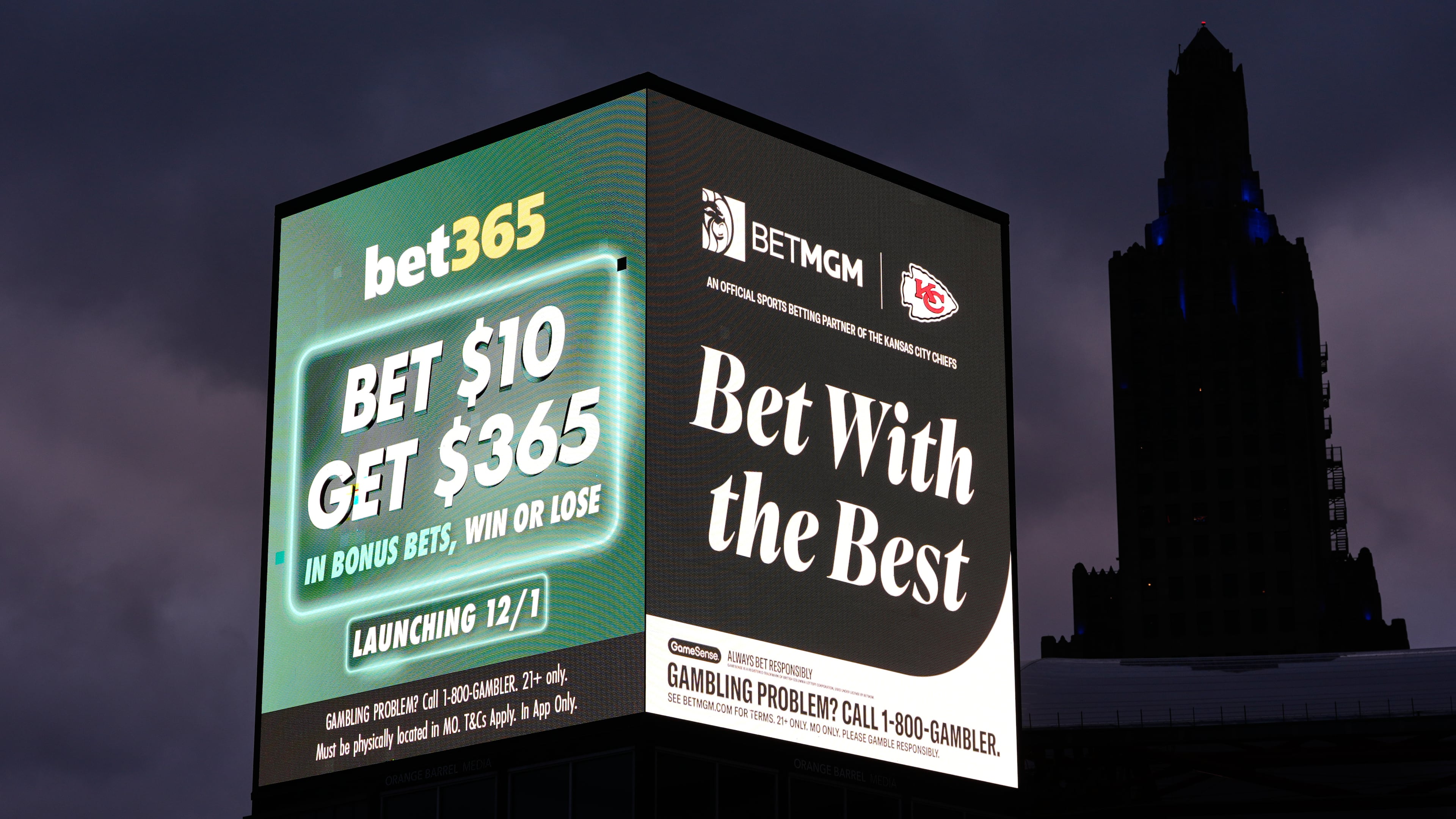 FILE - Advertisements for sports betting apps are seen in downtown Kansas City, Mo., Nov. 29, 2025. (AP Photo/Charlie Riedel, File)