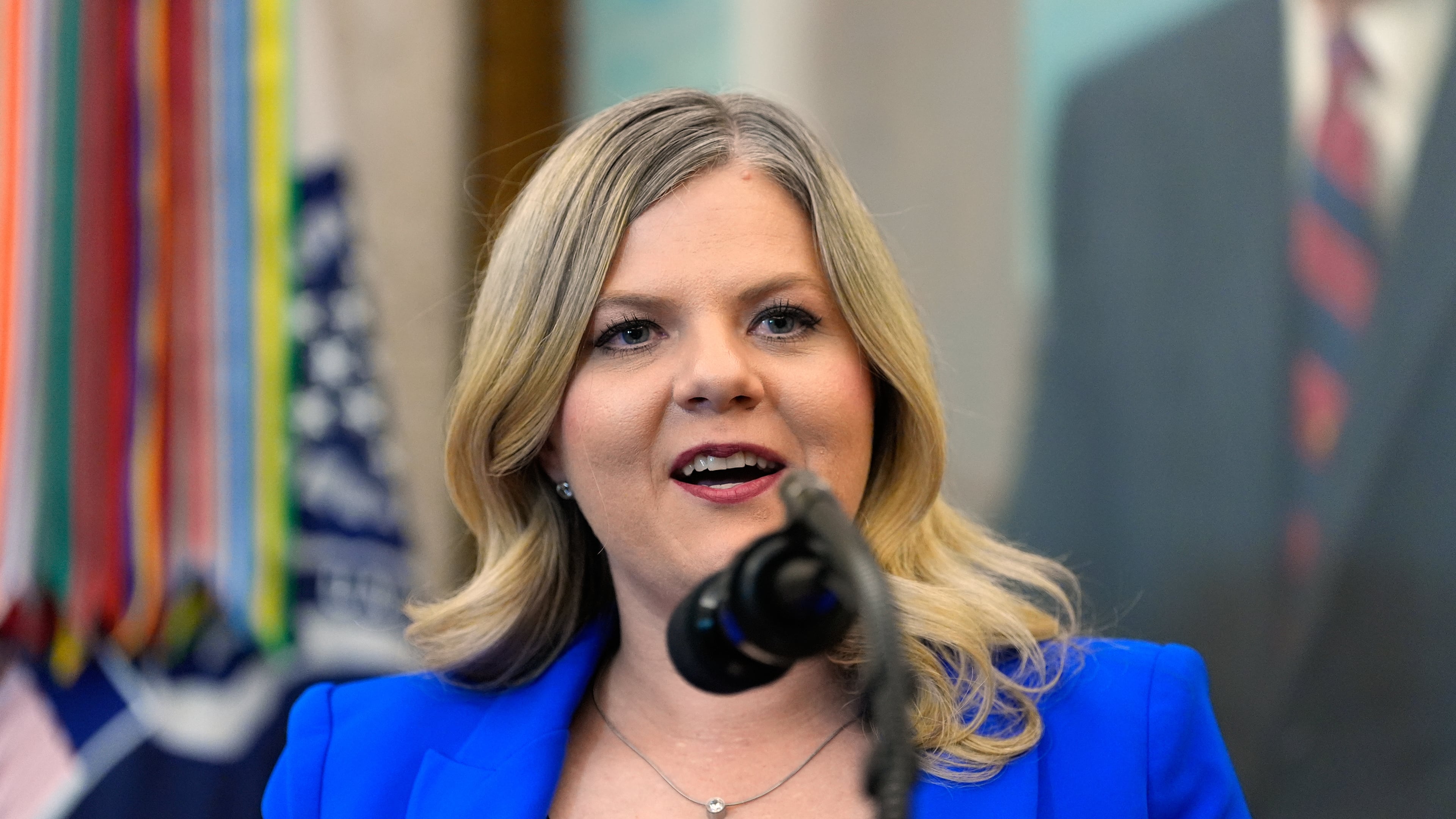 FILE - Dr. Heidi Overton, Deputy Director of the White House Domestic Policy Council, speaks about IVF during an event in the Oval Office of the White House with President Donald Trump, Oct. 16, 2025, in Washington. (AP Photo/Alex Brandon, File)