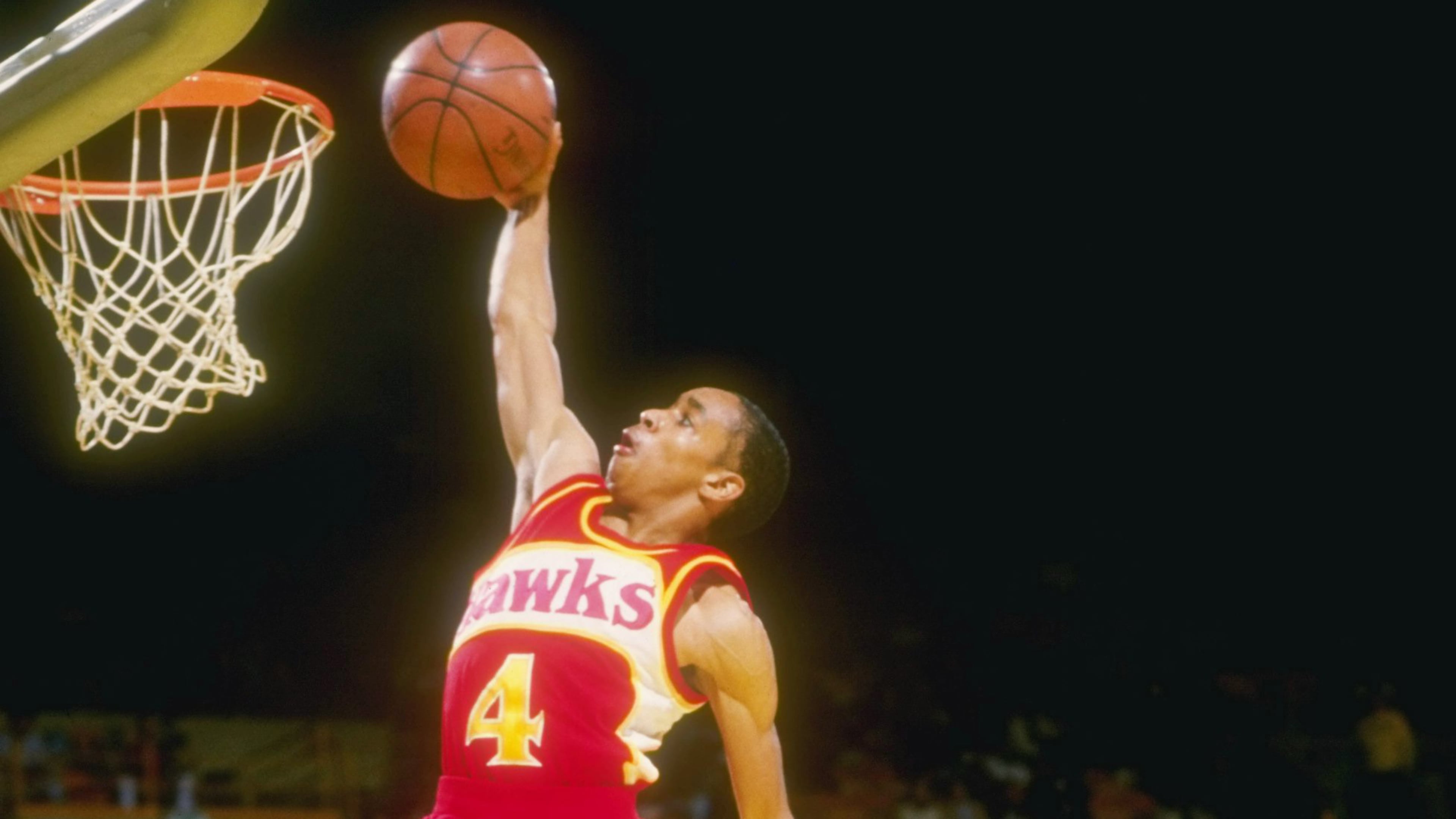 Spud Webb of the Hawks leaps to victory during a game against the Los Angeles Lakers at The Forum in Inglewood, California. Stephen Dunn /Allsport