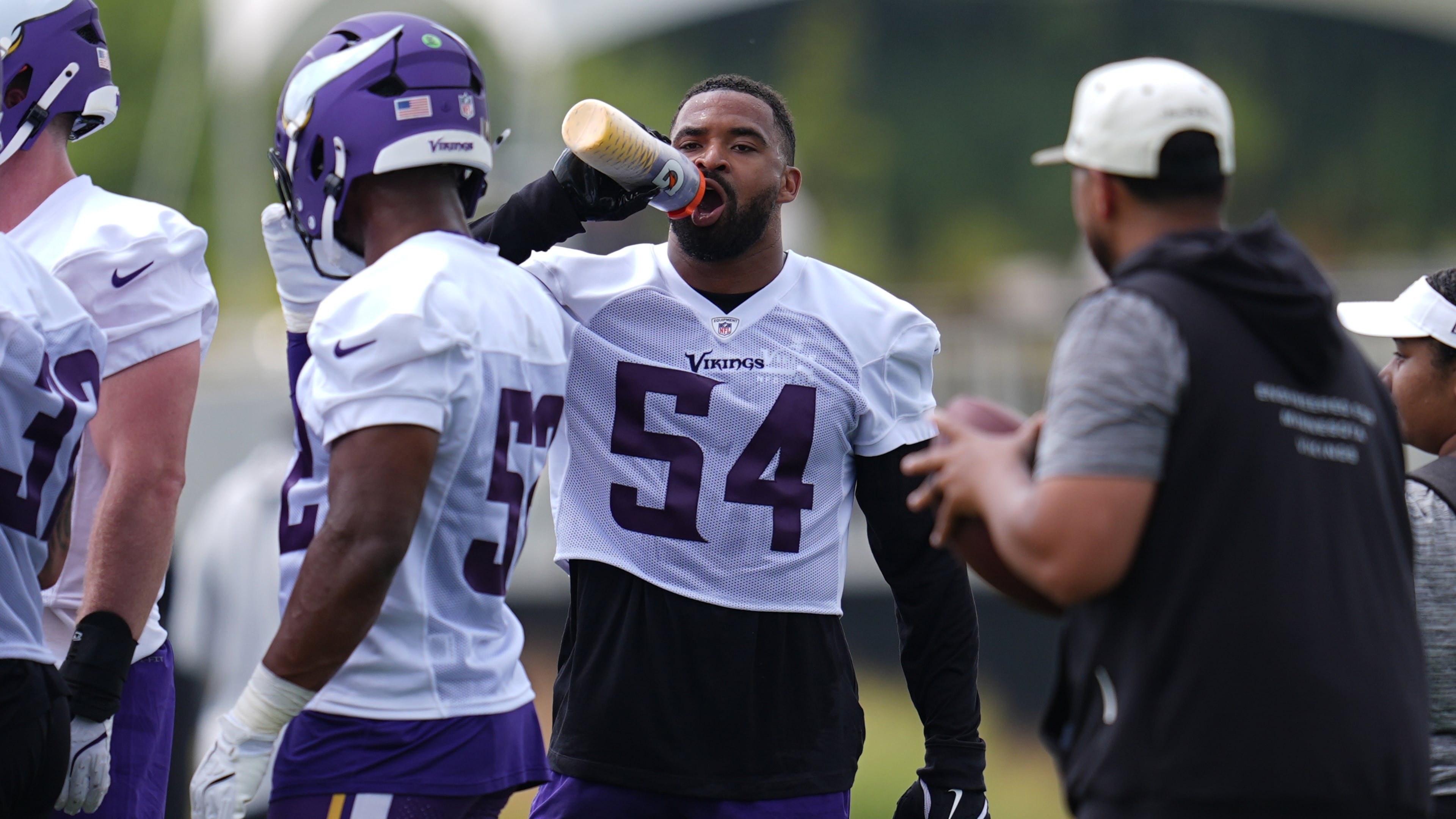 Minnesota Vikings linebacker Jamal Adams (54) hydrates during the team's NFL football training camp Wednesday, July 29, 2026, in Eagan, Minn. (AP Photo/Abbie Parr)