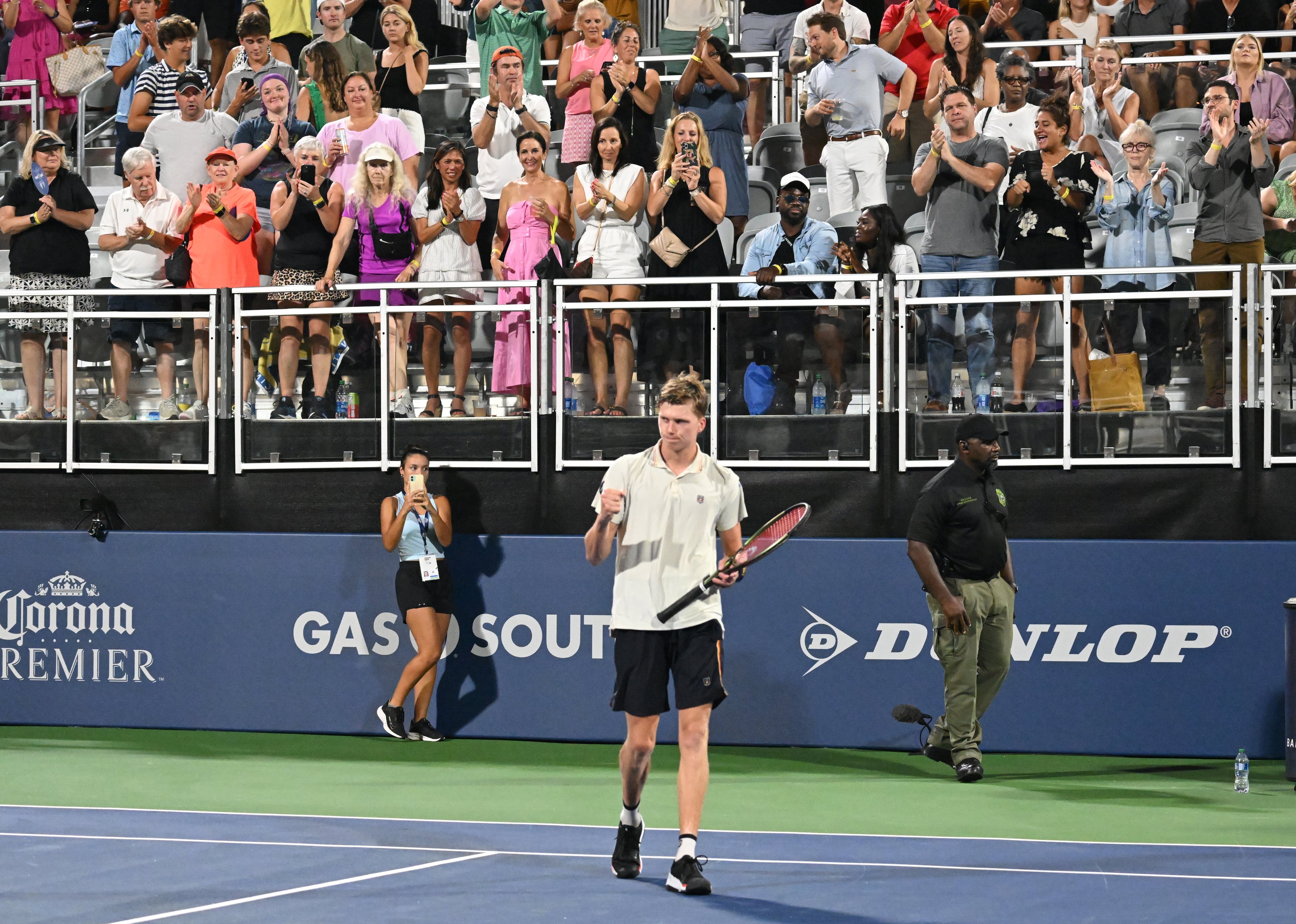 July 29, 2022 Atlanta - Jenson Brooksby celebrates his win over John Isner during a men singles quarterfinal match at the 2022 Atlanta Tennis Open at Atlantic Station on Friday, July 29, 2022. (Hyosub Shin / Hyosub.Shin@ajc.com)