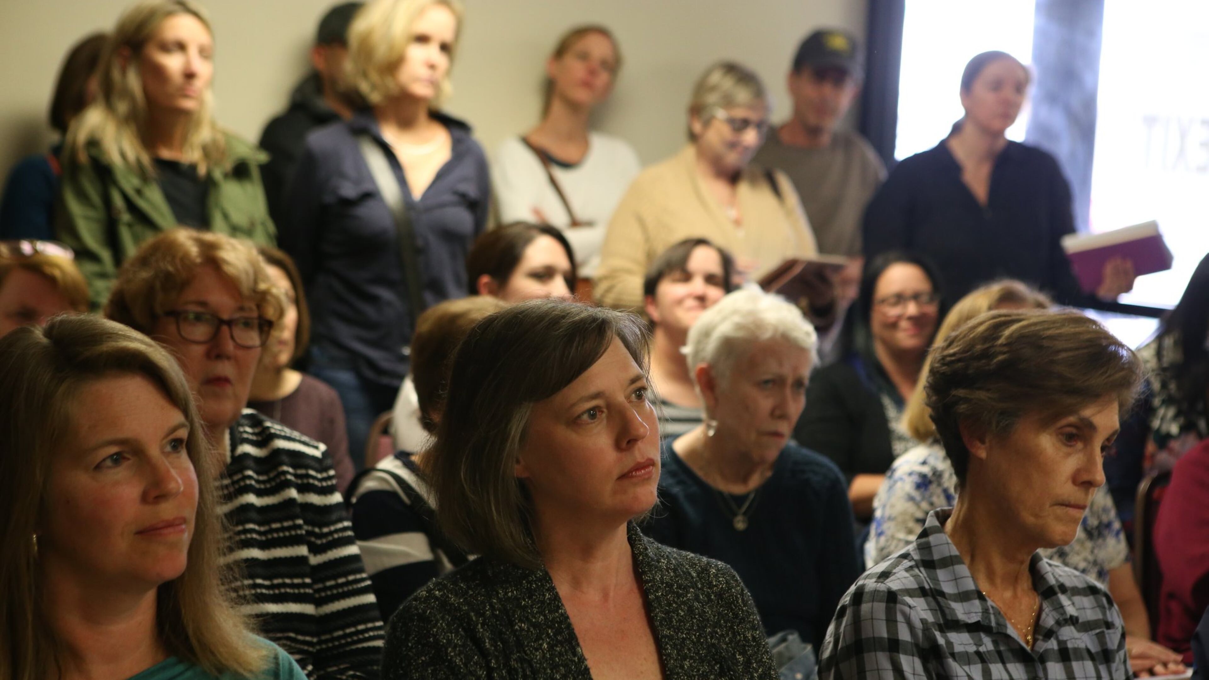 Kate Sweeney, former state Rep. Sally Harrell and Kimberly Todd listen to a DeKalb County resident speaking in support of more early voter sites at a DeKalb County Voter Registration & Elections Board meeting on April 24, 2017. Voters and even residents from outside of the 6th Congressional District went to the meeting to push the Elections Board to open more early voting sites after only two were open for the election on April 18th. (HENRY TAYLOR / HENRY.TAYLOR@AJC.COM)