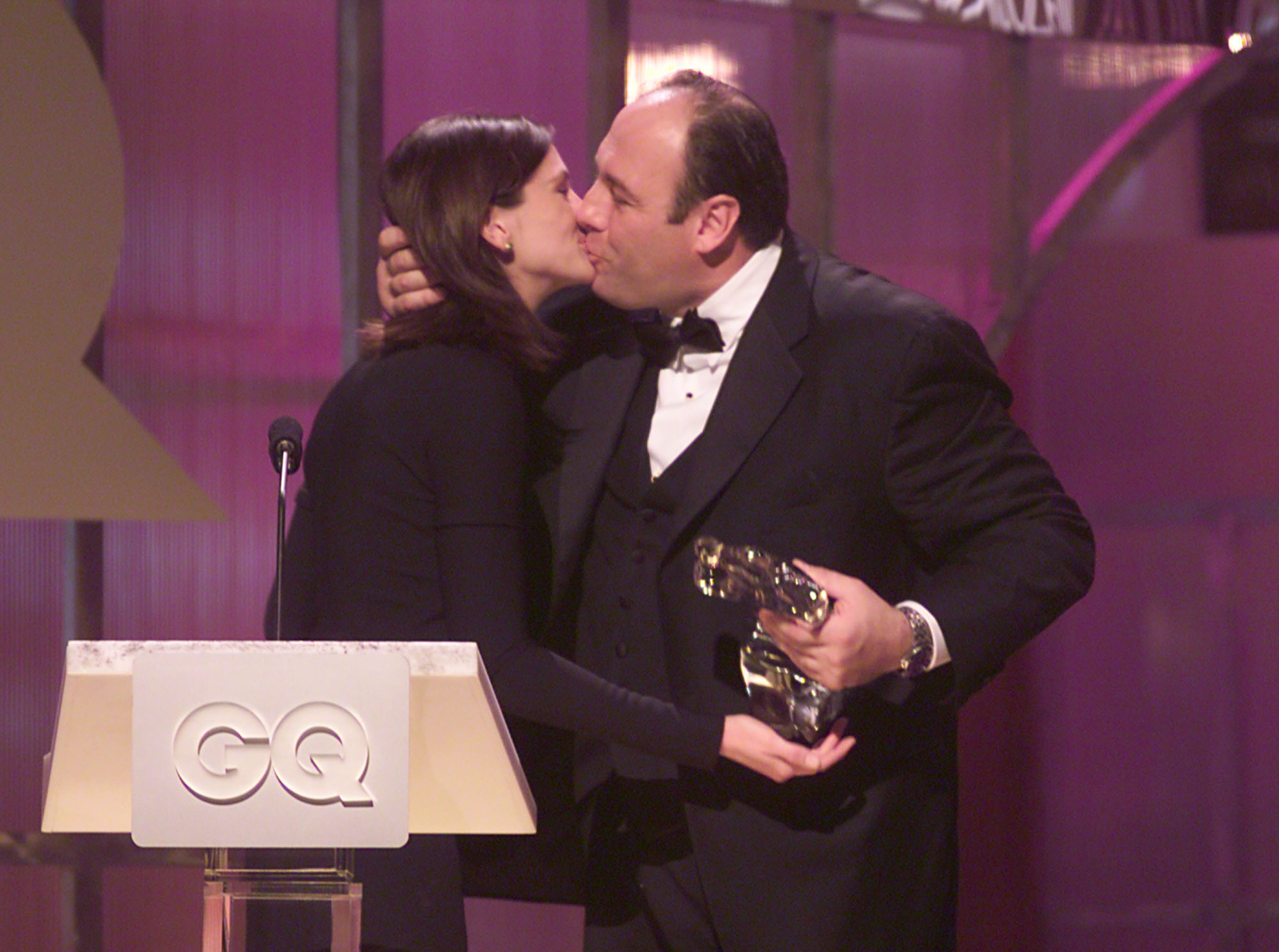 James Gandolfini kisses Julia Roberts after she presented hi with the 'Television Drama Award' at the 2000 GQ 'Men of the Year' Awards at the Beacon Theater in New York City, Oct. 26, 2000.