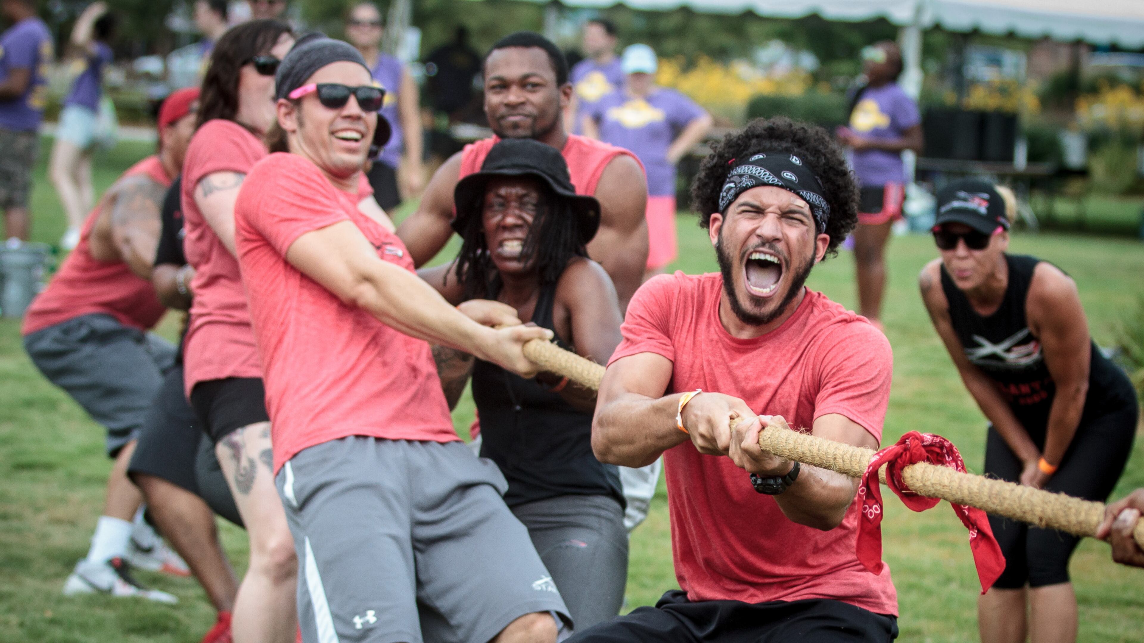 Tristan Shonfelt celebrates after his team wins the tug of war contest during Atlanta Field Day in Atlanta last year. Kids and families can participate in tug of war and other outdoor events at a free family field day Saturday in Gwinnett.