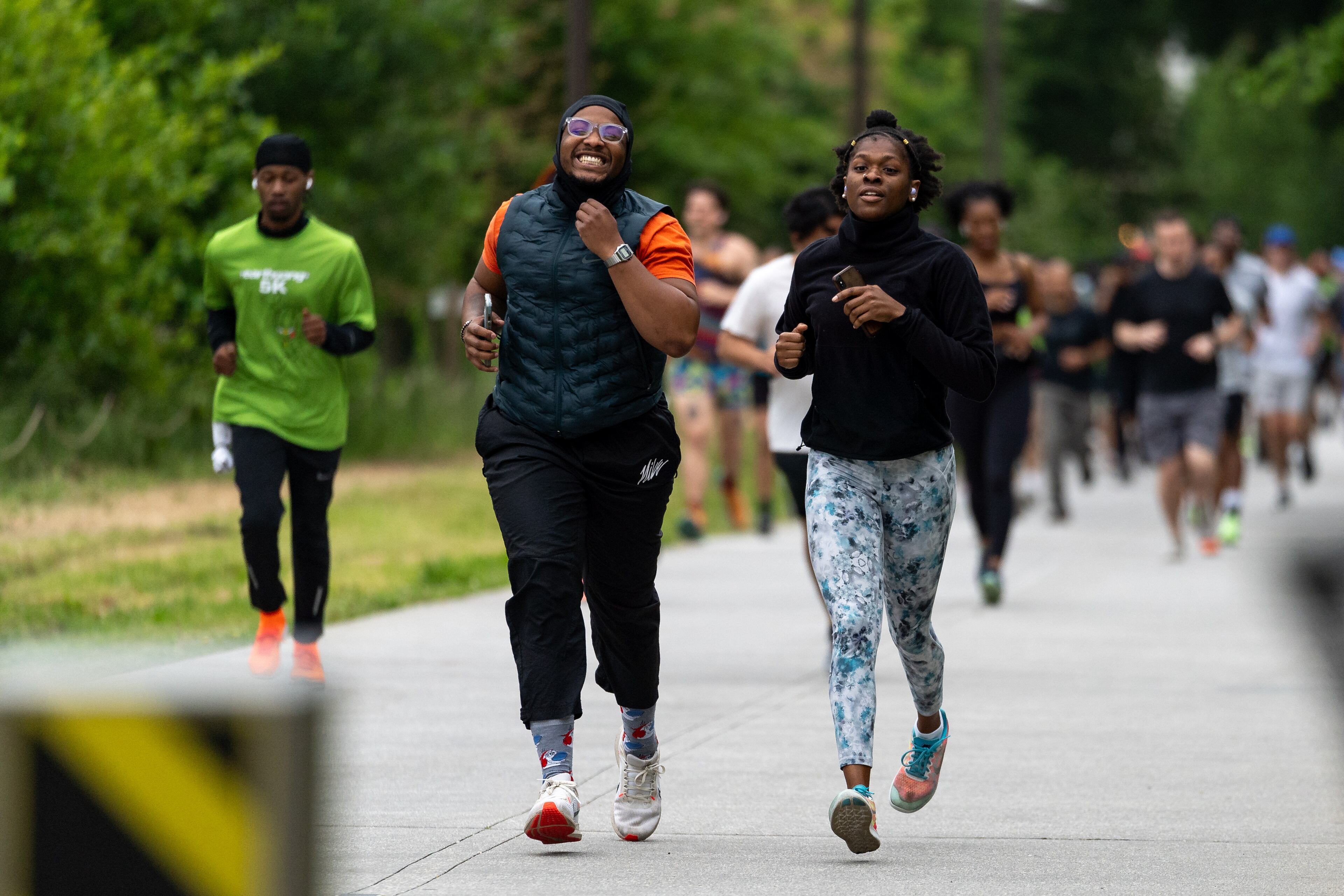Runners gathered for the first annual Earthgang 5k run on Atlanta's Eastside Beltiline on Saturday, April 17, 2024. Atlanta rap duo Earthgang organized the free through their namesake non-profit foundation, which focuses on sustainability and environmental conservation. (Ben Hendren for The Atlanta Journal-Constitution)