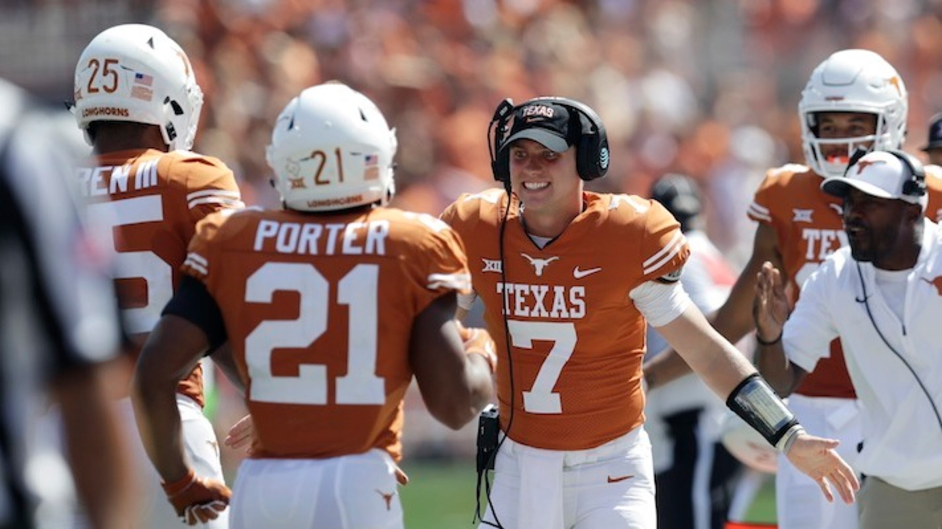 Texas quarterback Shane Buechele (7) celebrates with teammates after a score against San Jose State during the first half of an NCAA college football game, Saturday, Sept. 9, 2017, in Austin, Texas. Texas won 56-0. (AP Photo/Eric Gay)