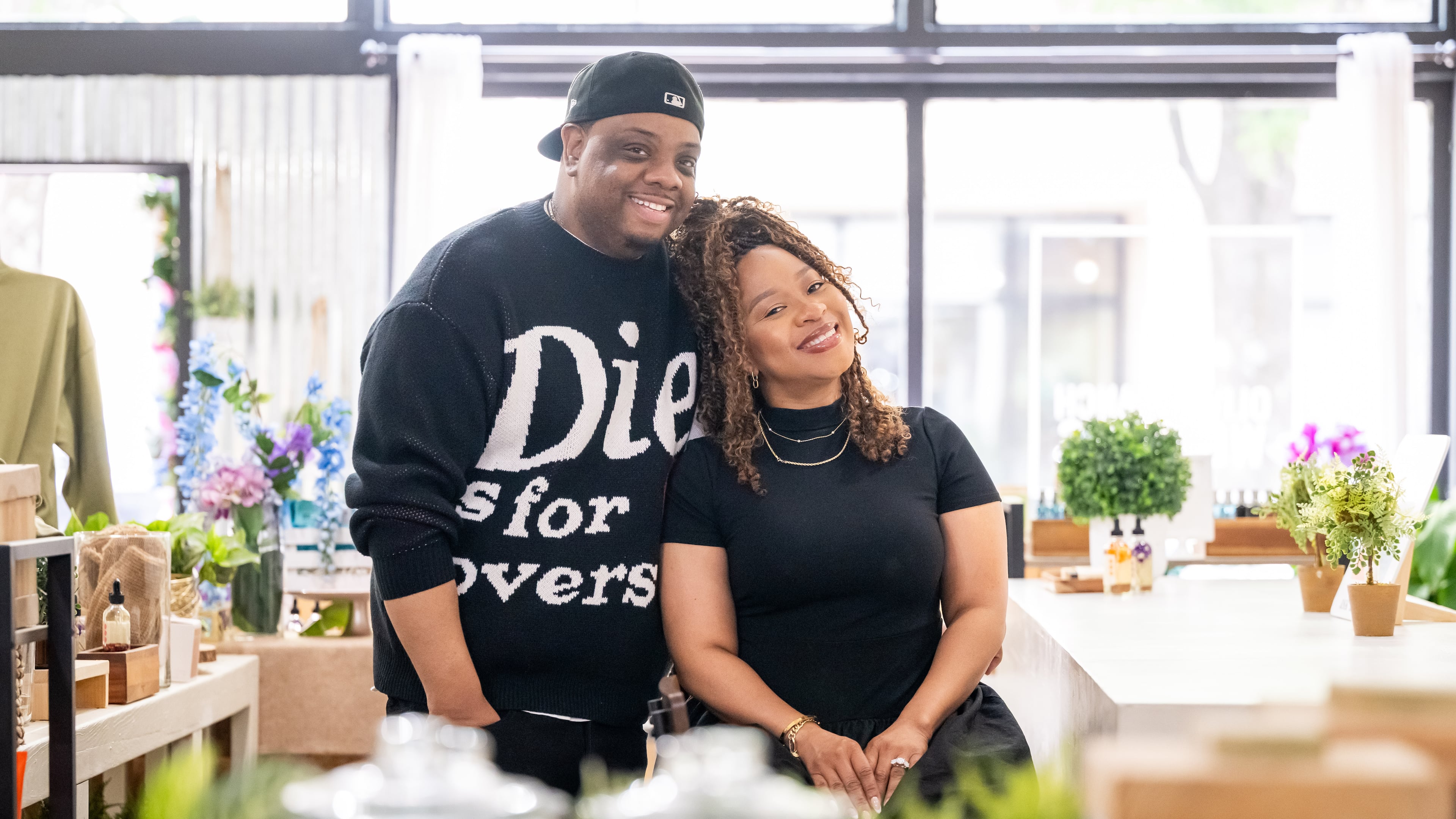 Aaron and Ty Jenkins, owners of Olive Branch in downtown Decatur, pose for a portrait in the middle of their store on Tuesday, April 29, 2025. (Bita Honarvar for the AJC)