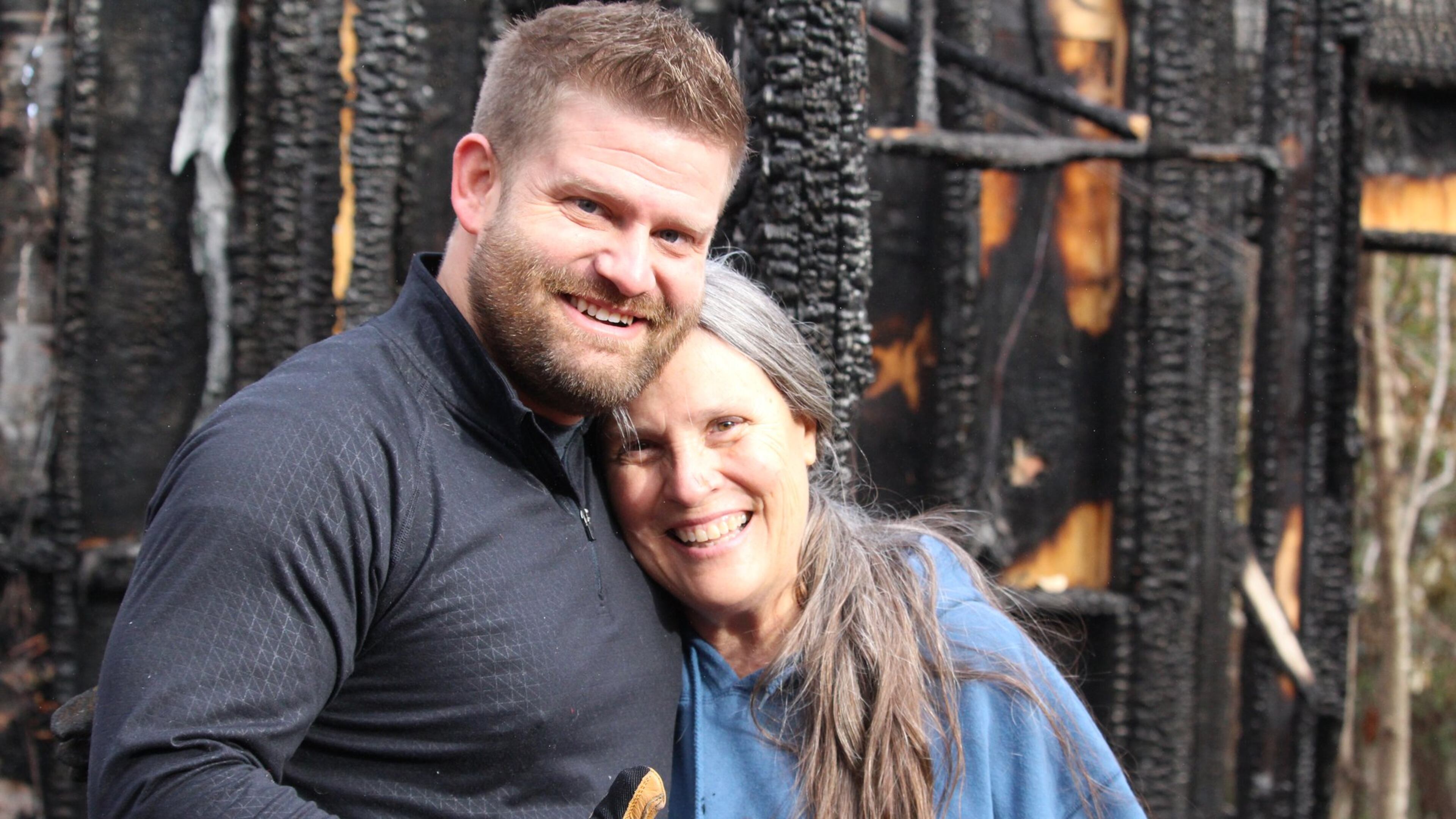 Chris Autry (left) and his wife (not pictured) started a GoFundMe account to raise money to rebuild Sandy Lyndon’s tiny house, which burned down Nov. 27. ELLEN ELDRIDGE / ELLEN.ELDRIDGE@AJC.COM