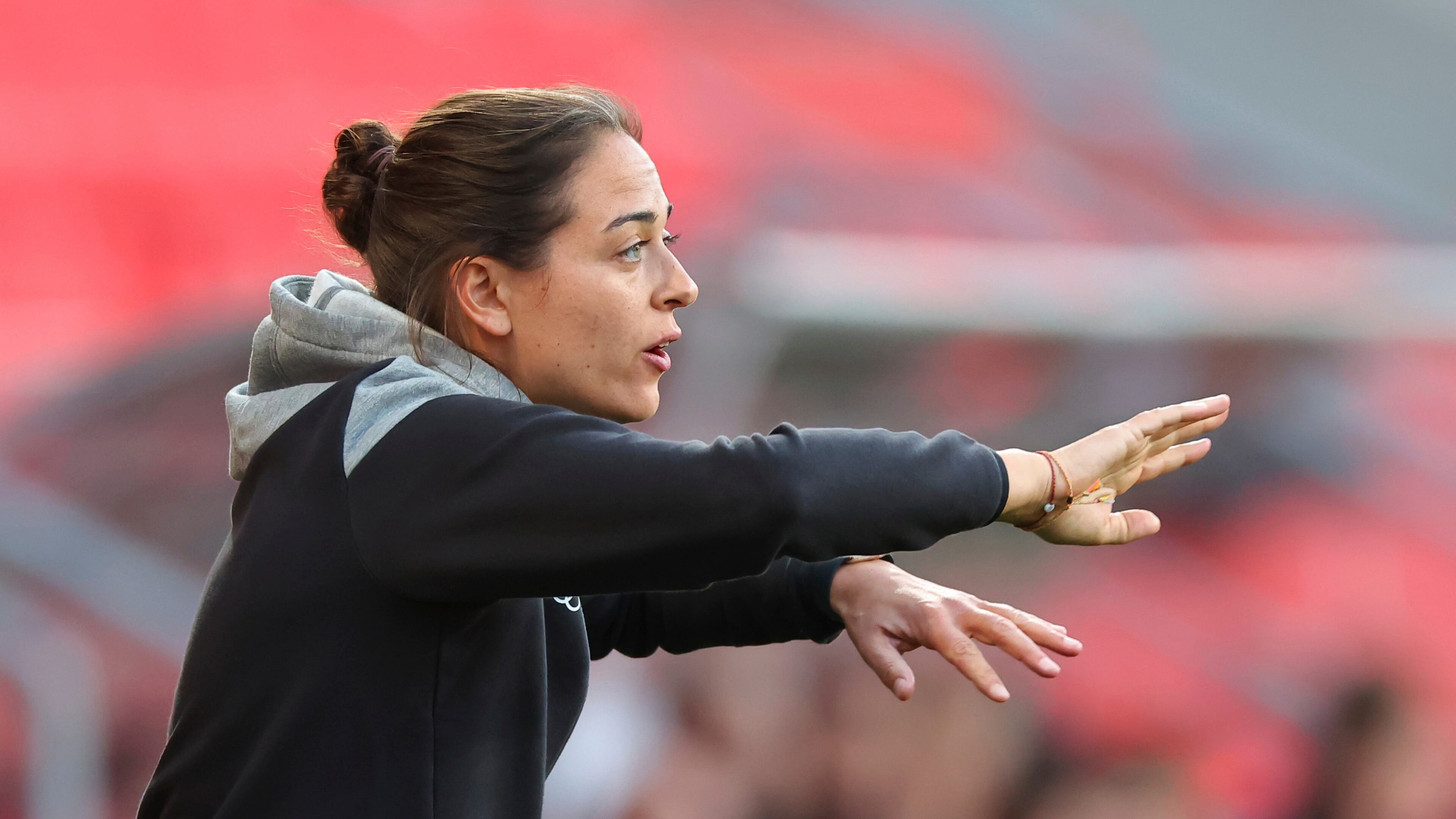 FILE - Coach Sabrina Wittmann gives instructions during the 3. Liga soccer match between FC Ingolstadt and SV Waldhof Mannheim, in Ingolstadt, on May 5, 2024. (Daniel Karmann/dpa via AP, File)