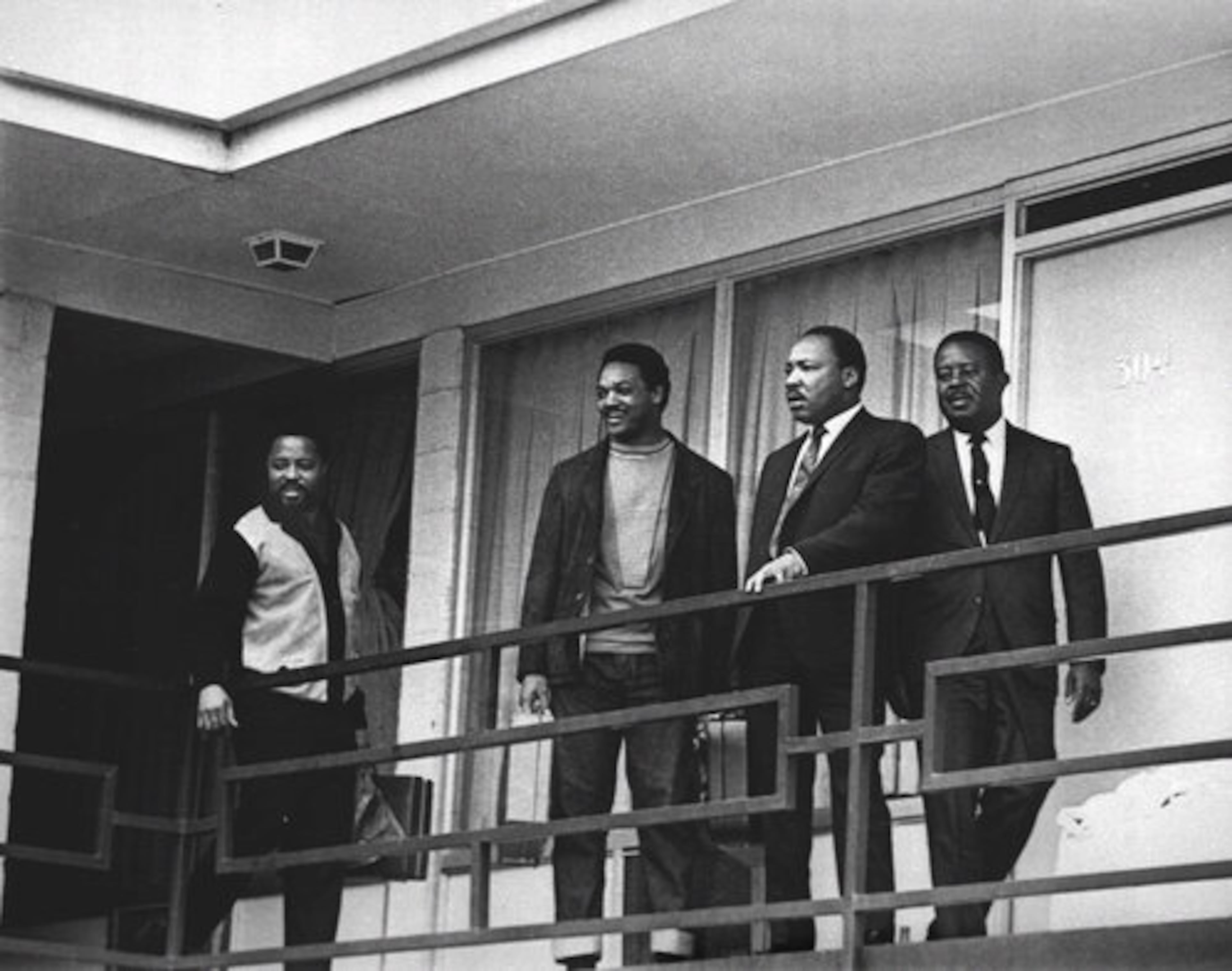 Martin Luther King Jr., second from right, stands on the balcony of the Lorraine Motel in Memphis, Tenn., on April 3, 1968, the day before he was assassinated there. From left are, Hosea Williams, Jesse Jackson, King, and Ralph Abernathy.