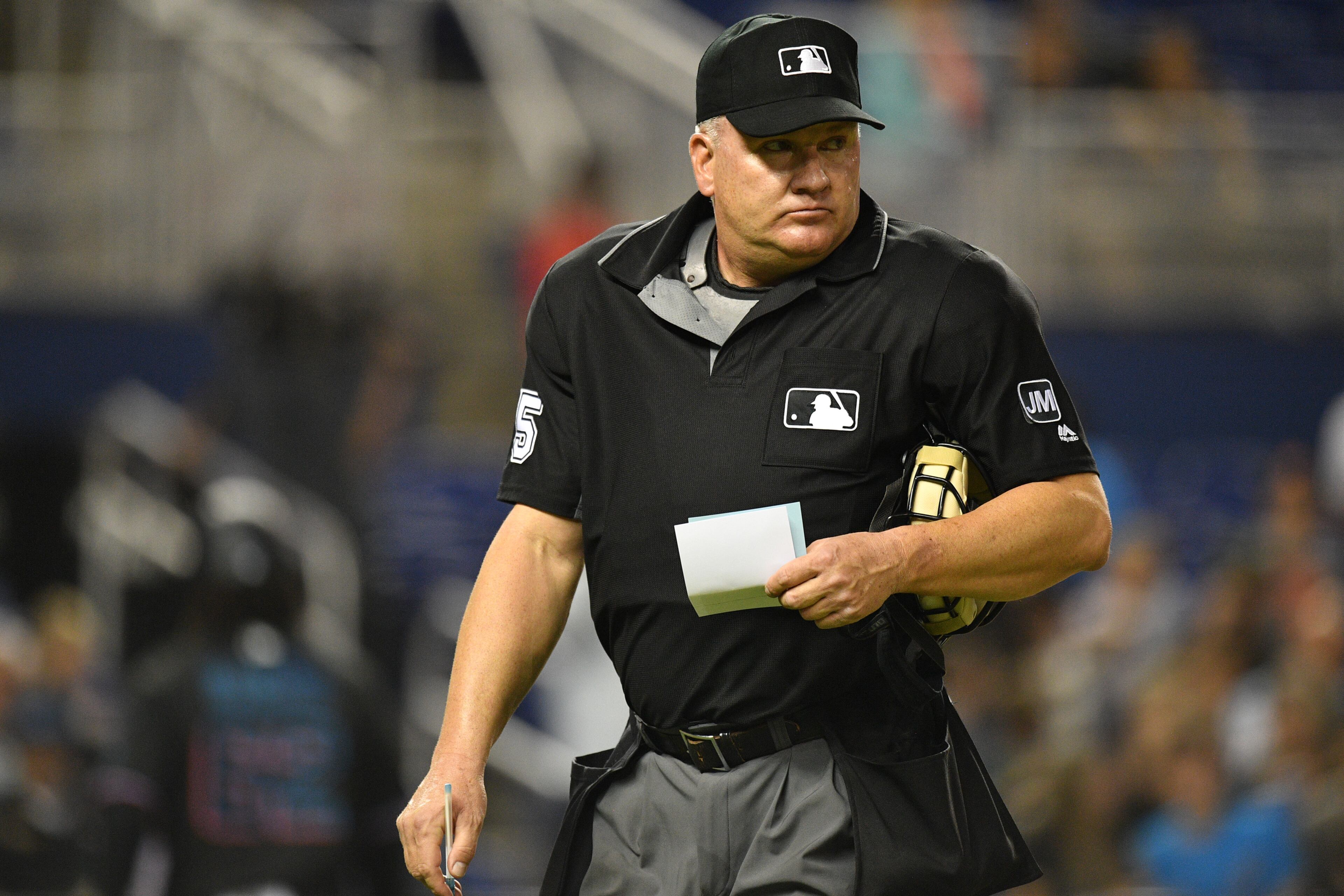 Umpire Jeff Nelson #45 waits for the next pitcher in the second inning during the gamebetween the Miami Marlins and the Atlanta Braves at Marlins Park on May 3, 2019 in Miami, Florida. (Photo by Mark Brown/Getty Images)