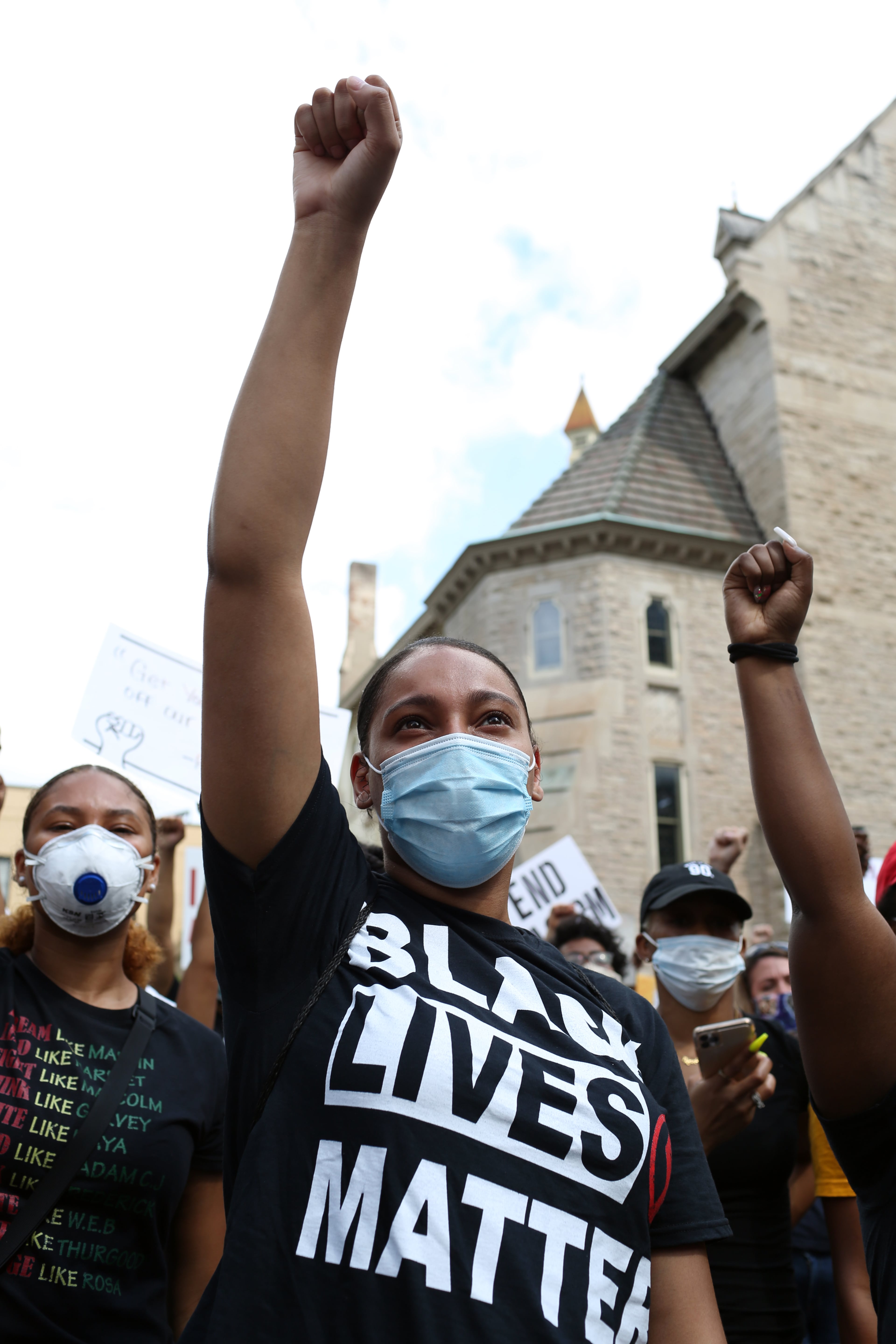 Tyesha Williams raises her fist as protesters gather at the Georgia State Capitol building in downtown Atlanta for March on Georgia, a protest hosted by the Georgia chapter for the NAACP, on Monday, June 15, 2020. (REBECCA WRIGHT FOR THE ATLANTA JOURNAL-CONSTITUTION)