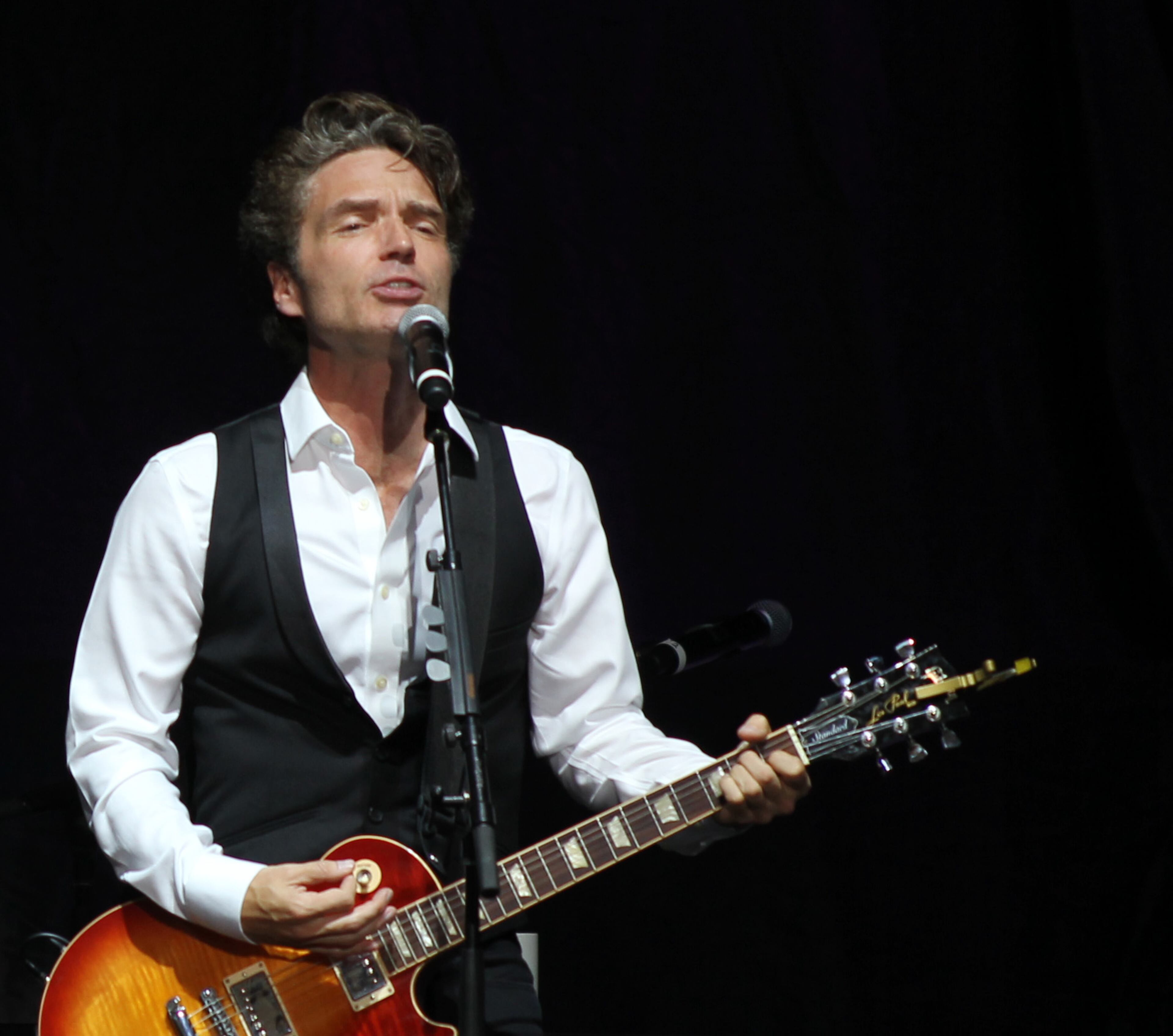 Richard Marx opened as special guest for Rod Stewart Wednesday, July 15, 2015 at Verizon Wireless Amphitheatre at Encore Park in Alpharetta. (Akili-Casundria Ramsess/Special to the AJC)