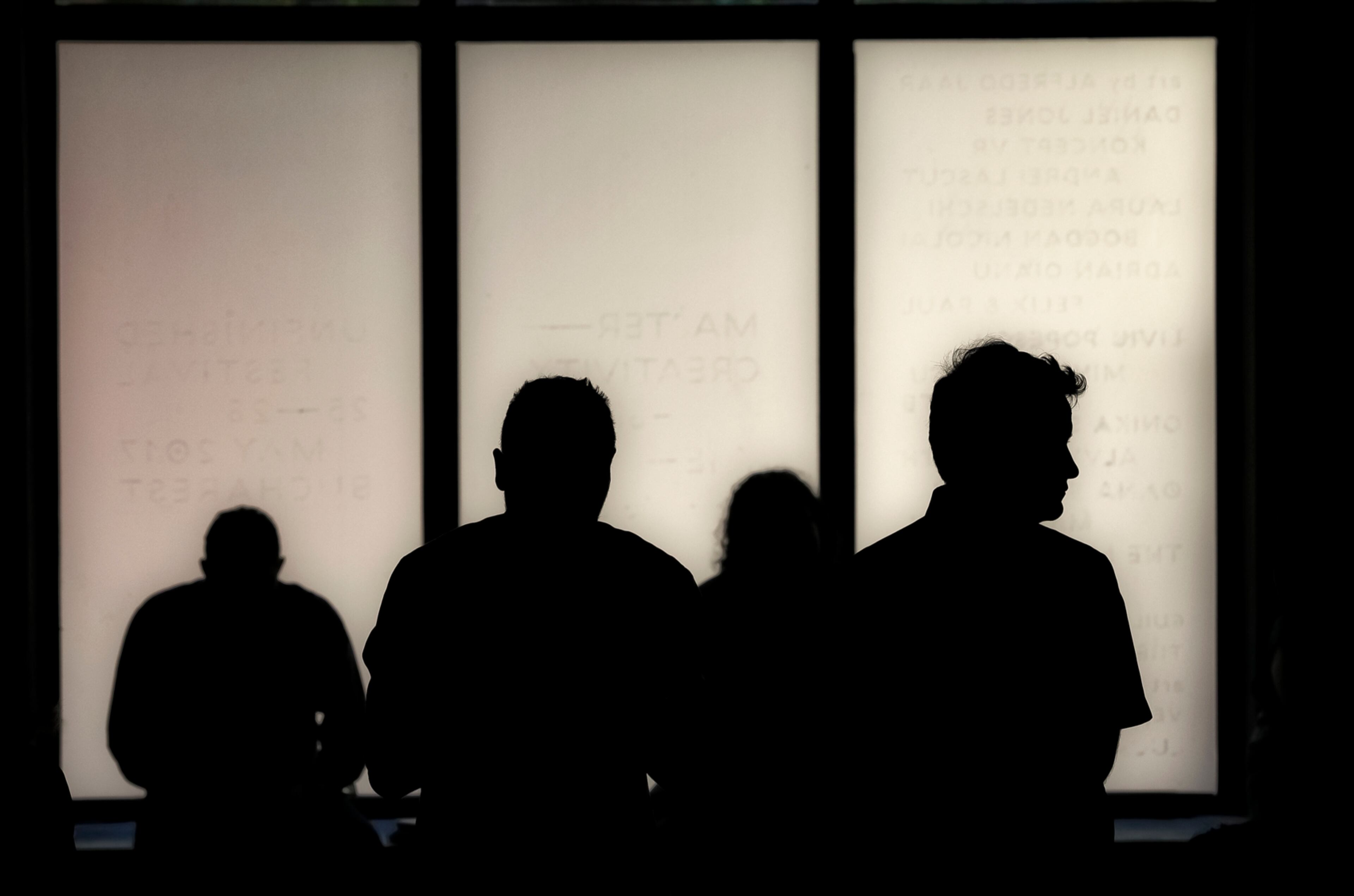 People attend a commemoration marking the extermination of thousands of Gypsies at a Nazi concentration camp, in Bucharest, Romania, Wednesday, Aug. 2, 2017. Romania's foreign ministry said young generations should be educated about "this tragic episode in European history" referring to Aug. 2, 1944 when some 3,000 Roma were exterminated in the gas chambers at Auschwitz.(AP Photo/Vadim Ghirda)