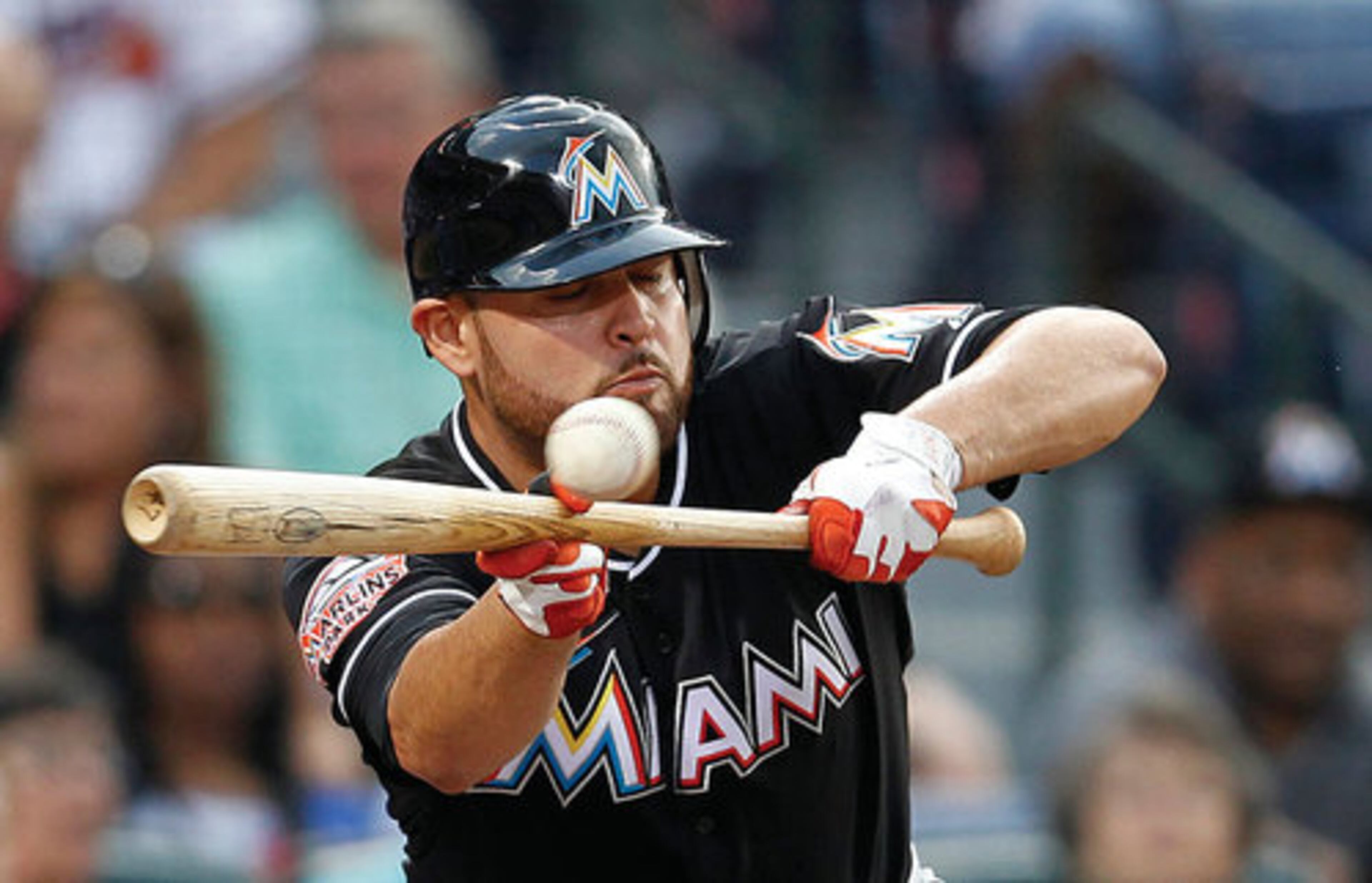Marlins pitcher Ricky Nolasco lays down a bunt in the third inning.Nolasco reached base on a bunt on the at-bat, and Brett Hayes was forced at second.