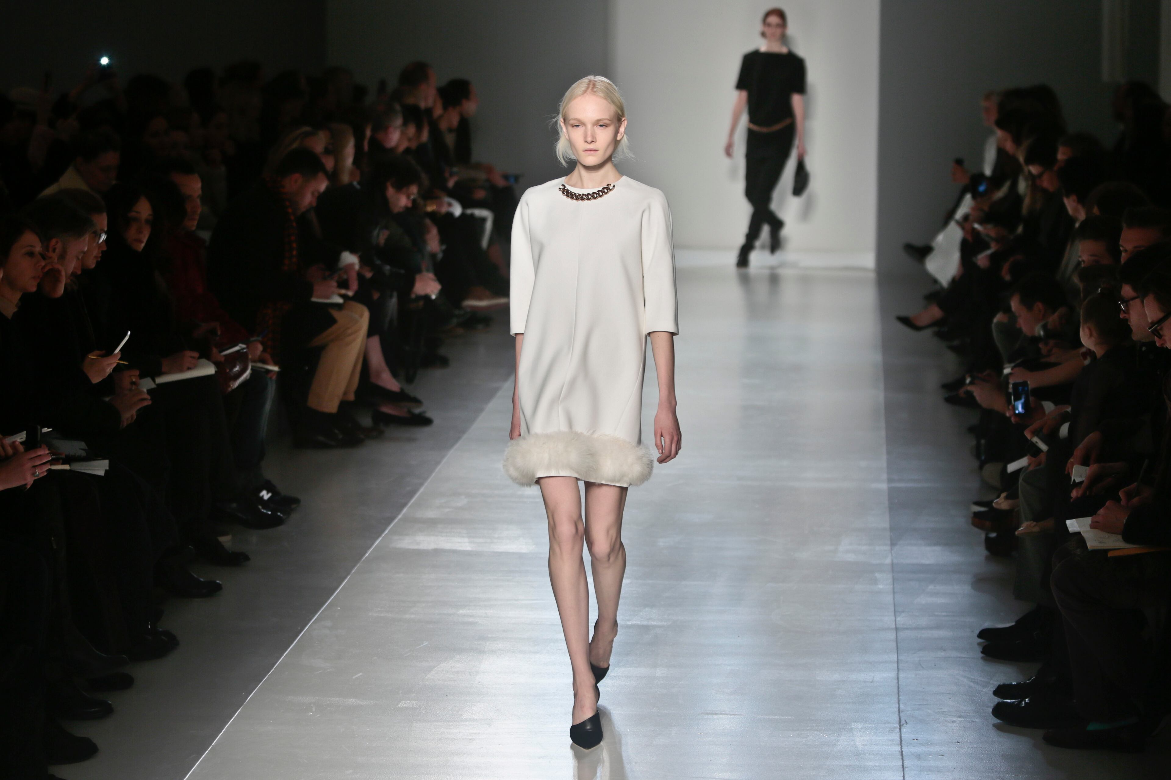 Fashion from the Victoria Beckham Fall 2014 collection is modeled, during New York Fashion Week on Sunday Feb. 9, 2014. (AP Photo/Bebeto Matthews)