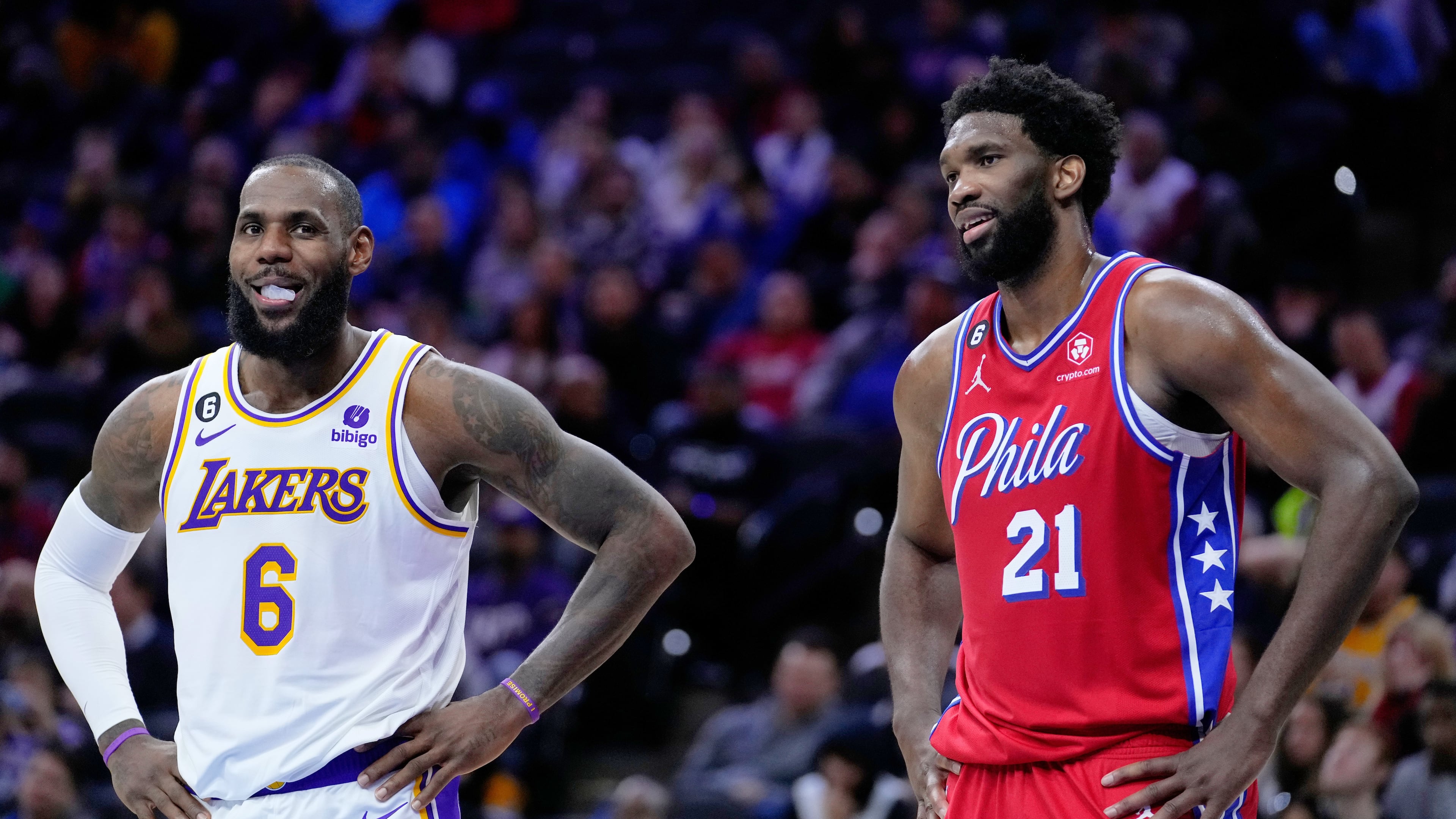 Los Angeles Lakers' LeBron James and Philadelphia 76ers' Joel Embiid play during an NBA basketball game, Friday, Dec. 9, 2022, in Philadelphia. (AP Photo/Matt Slocum, File)