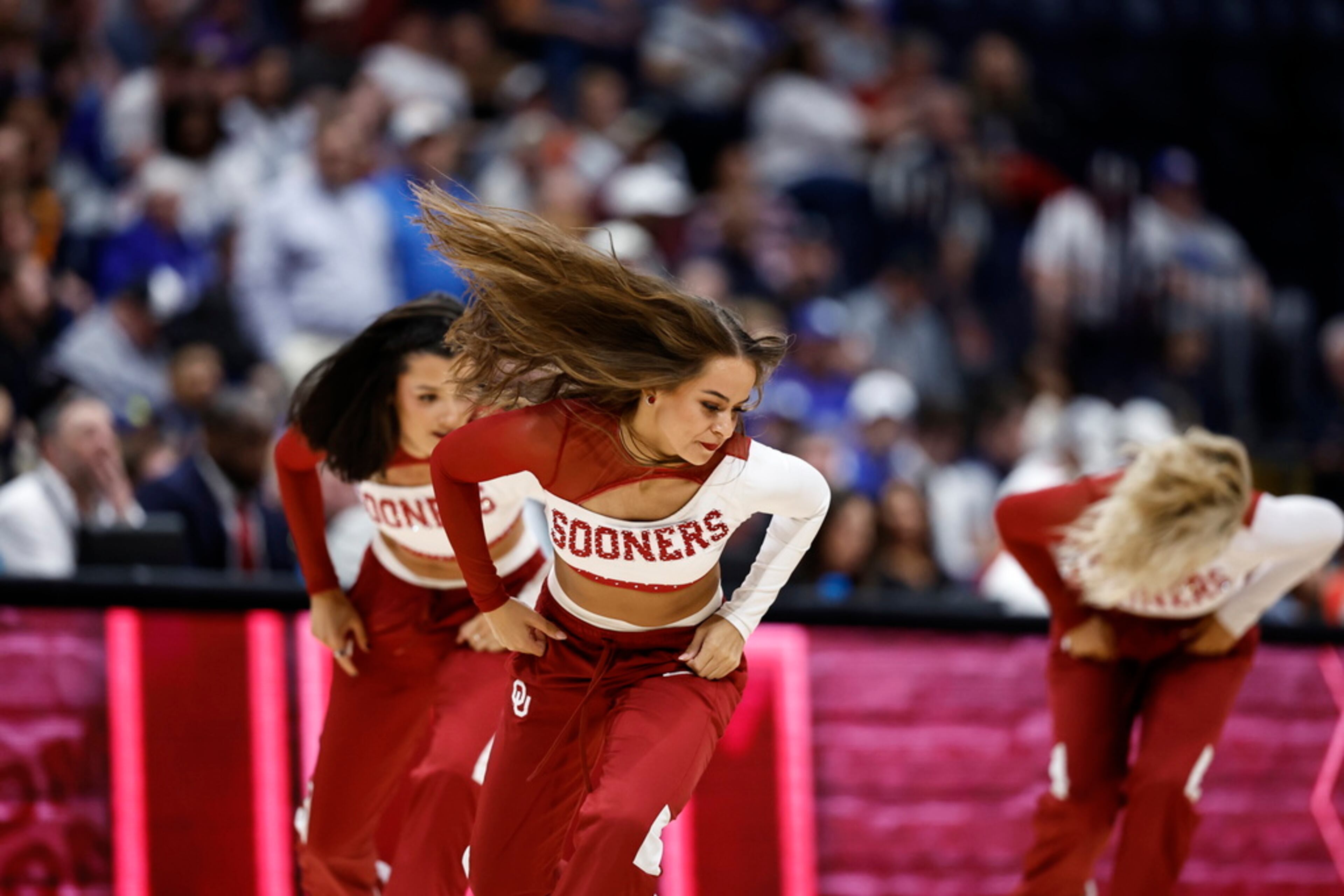 Oklahoma cheerleaders perform during the first half of an NCAA college basketball game against Georgia at the Southeastern Conference tournament, Wednesday, March 12, 2025, in Nashville, Tenn. (AP Photo/Wade Payne)