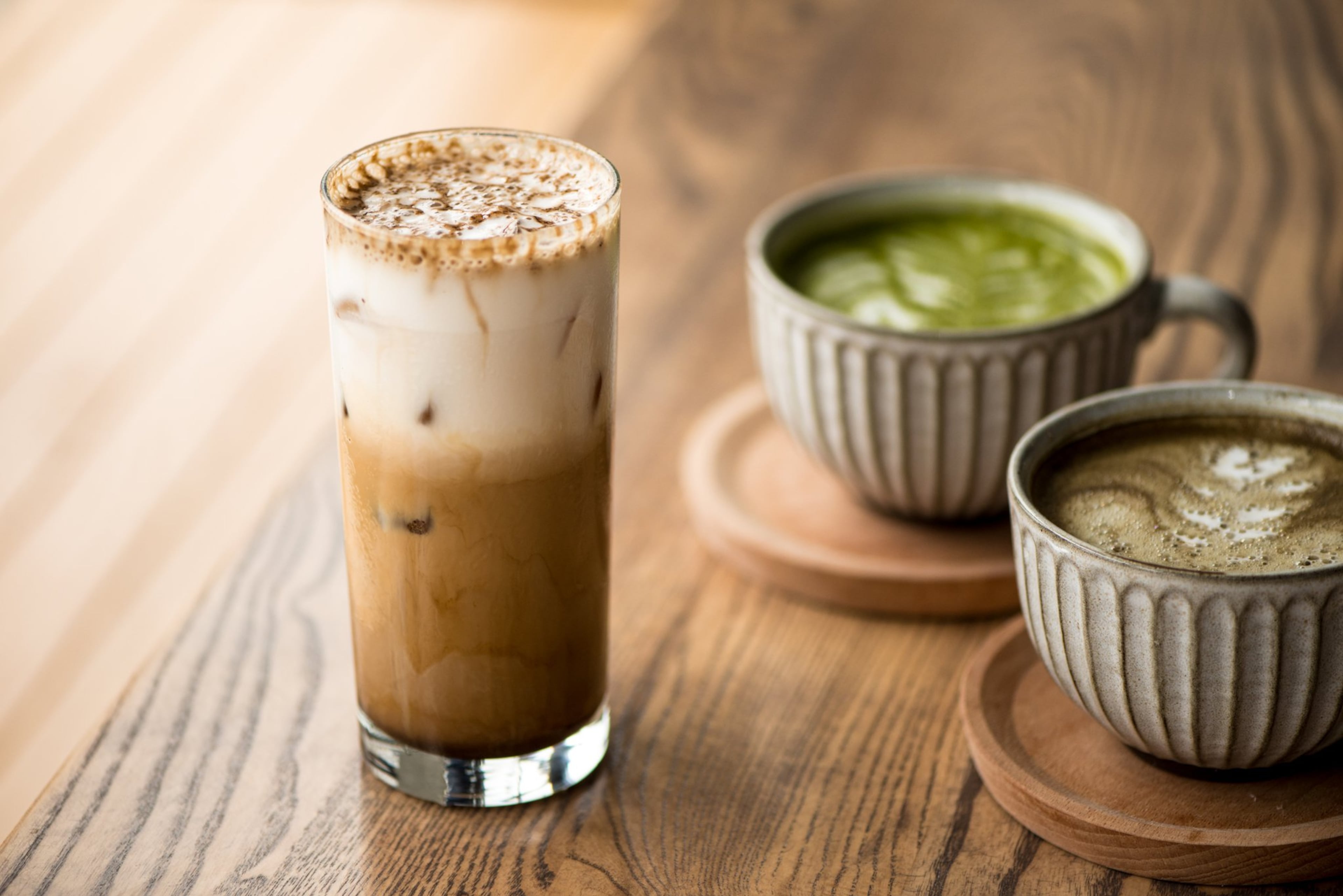 Momonoki Okinawa Brown Sugar Latte, Matcha Latte and Hoji Cha Latte. Photo credit- Mia Yakel.