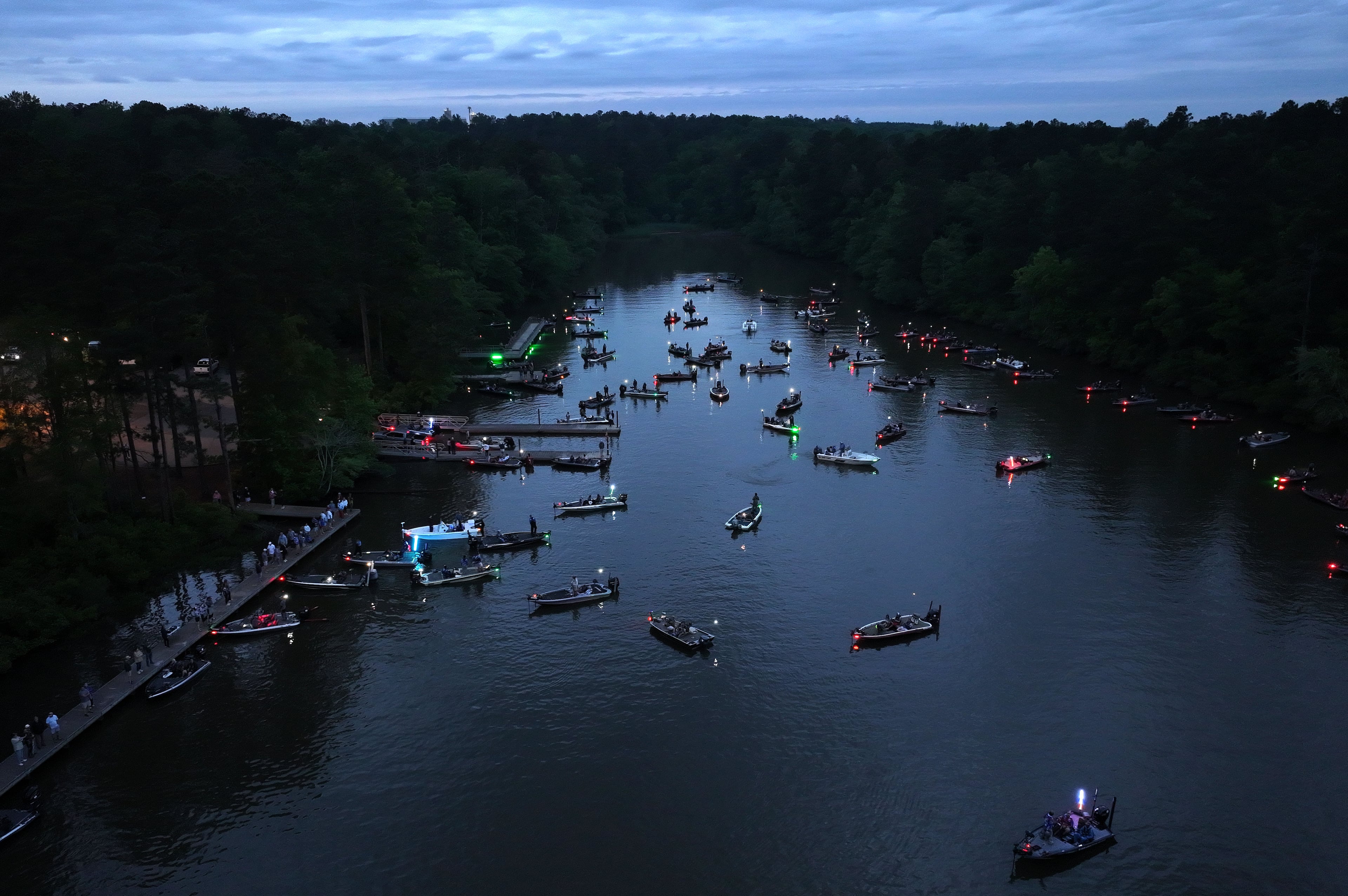 Contestants wait on the Lake Sinclair for the start of the GHSA State Bass Fishing Championship on Saturday, May 9, 2026, in Eatonton. (Hyosub Shin/AJC)
